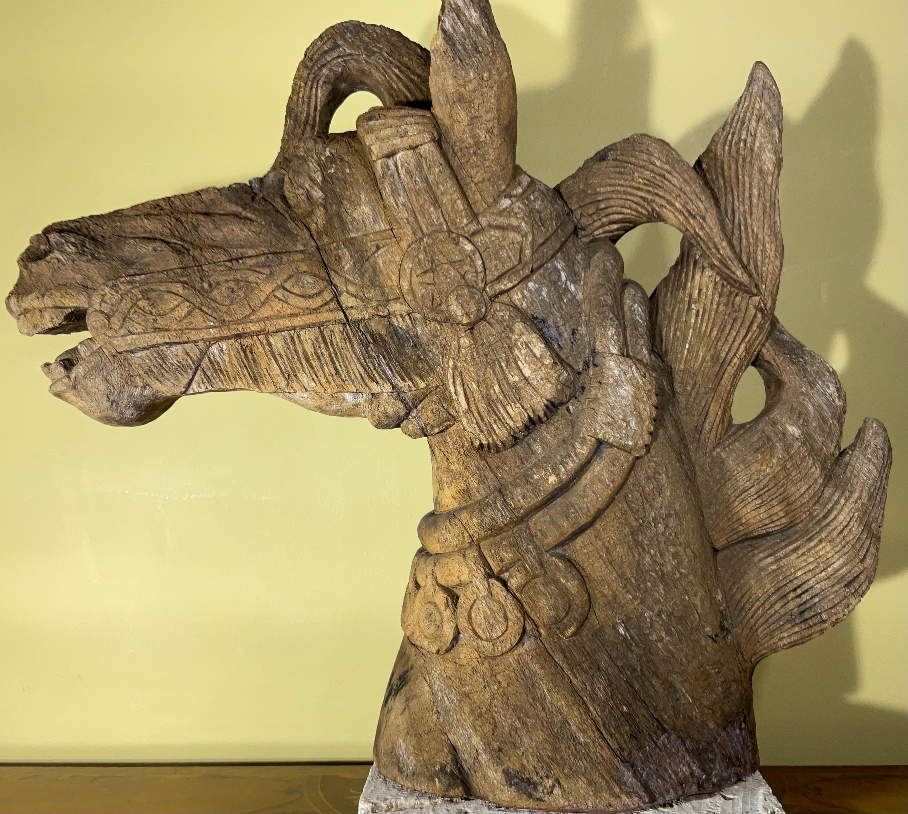 Exceptional hand carved antique horse head great detailed and age patina . professionally restored to be presentable and secured ,although without the obvious missing ear that was too much to interfere with the authenticity of the antique piece