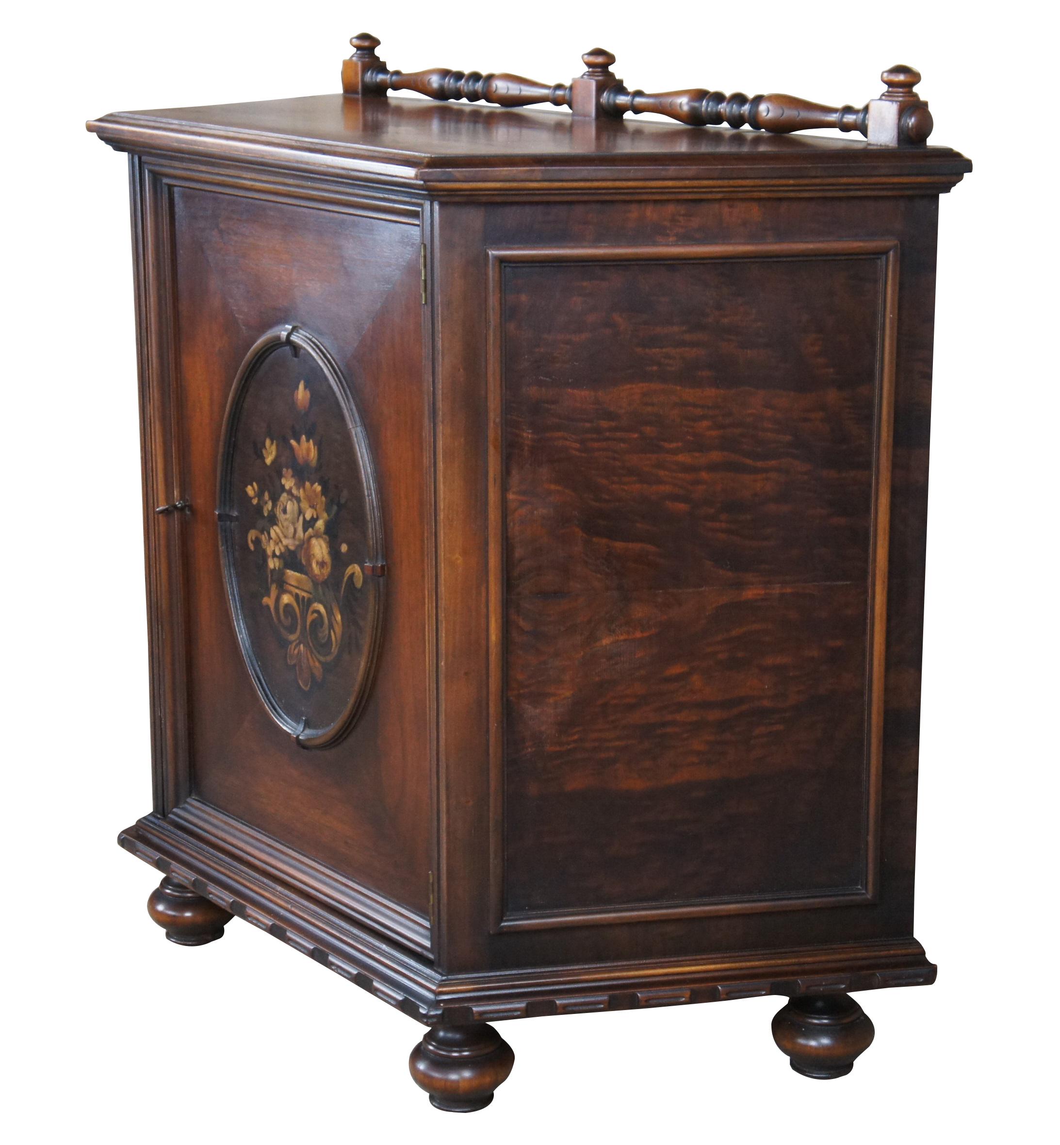 Antique Life Time Furniture buffet, sideboard or cabinet.  Made of walnut featuring trapezoid form with Jacobean and Spanish styling.  Features Upper turned gallery, painted floral bouquet, turned bun feet and red painted interior with two shelves.