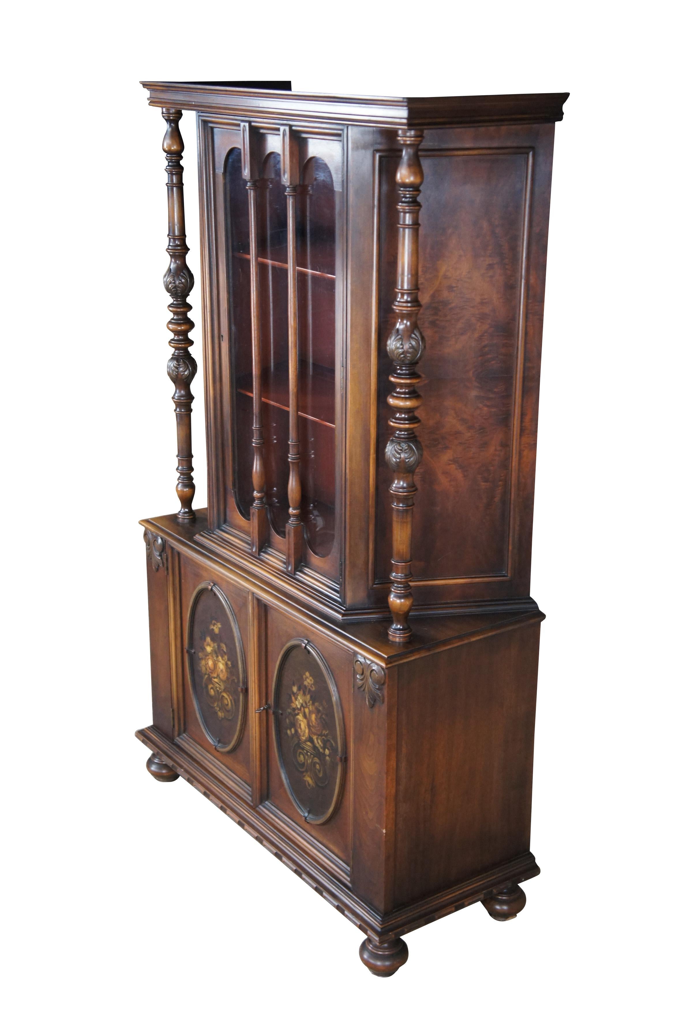 Antique Life Time Furniture china cabinet / hutch.  Made of walnut featuring Jacobean styling with hand turned supports with acanthus carvings.  The curio cabinet features red painted interior with arcade form door and turned spindle coverings.  The