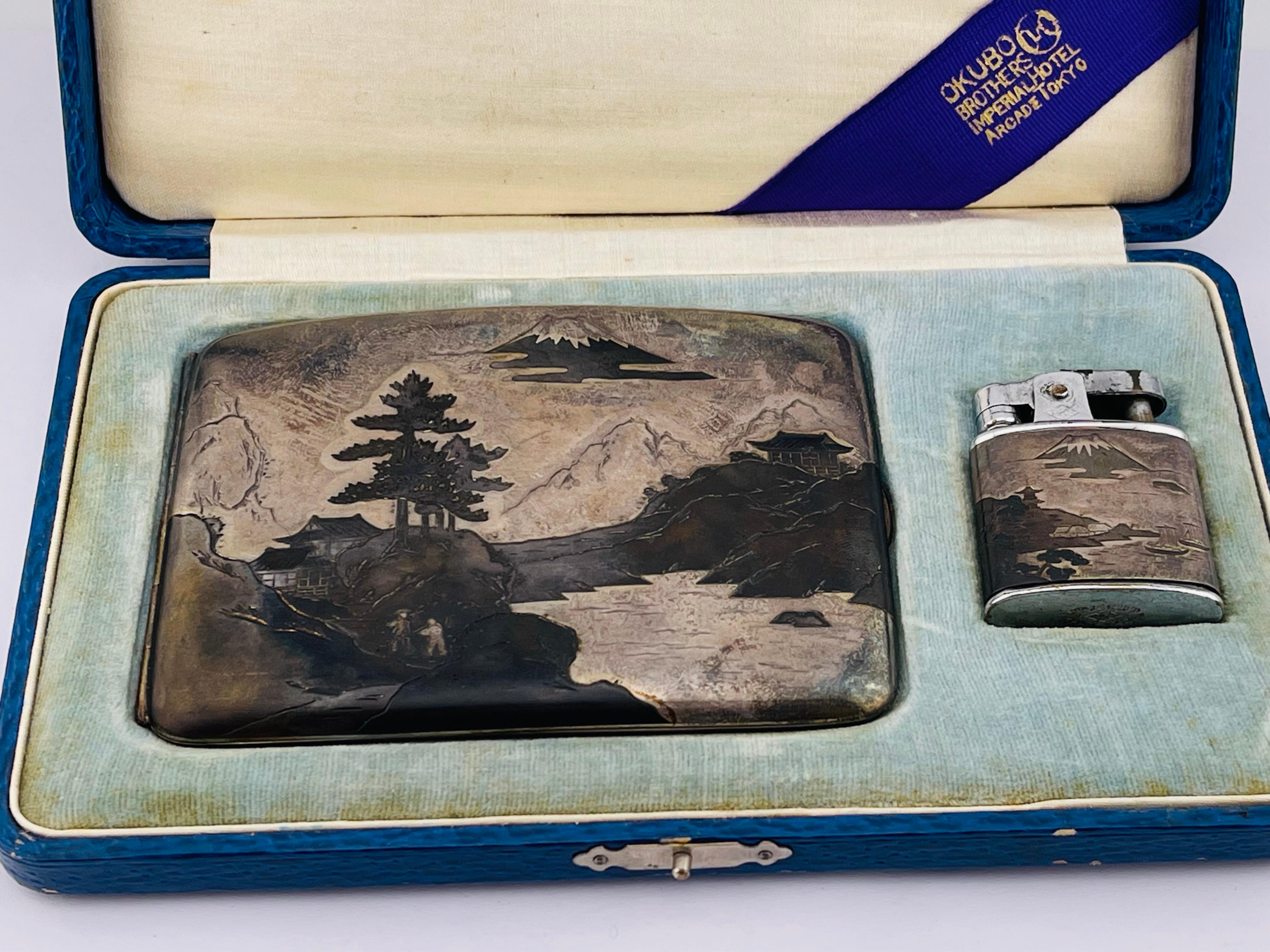 Antique Lighter & Cigarette Case Hand engraved with original box 
Tokyo, Japan OKUBO Sterling 950


