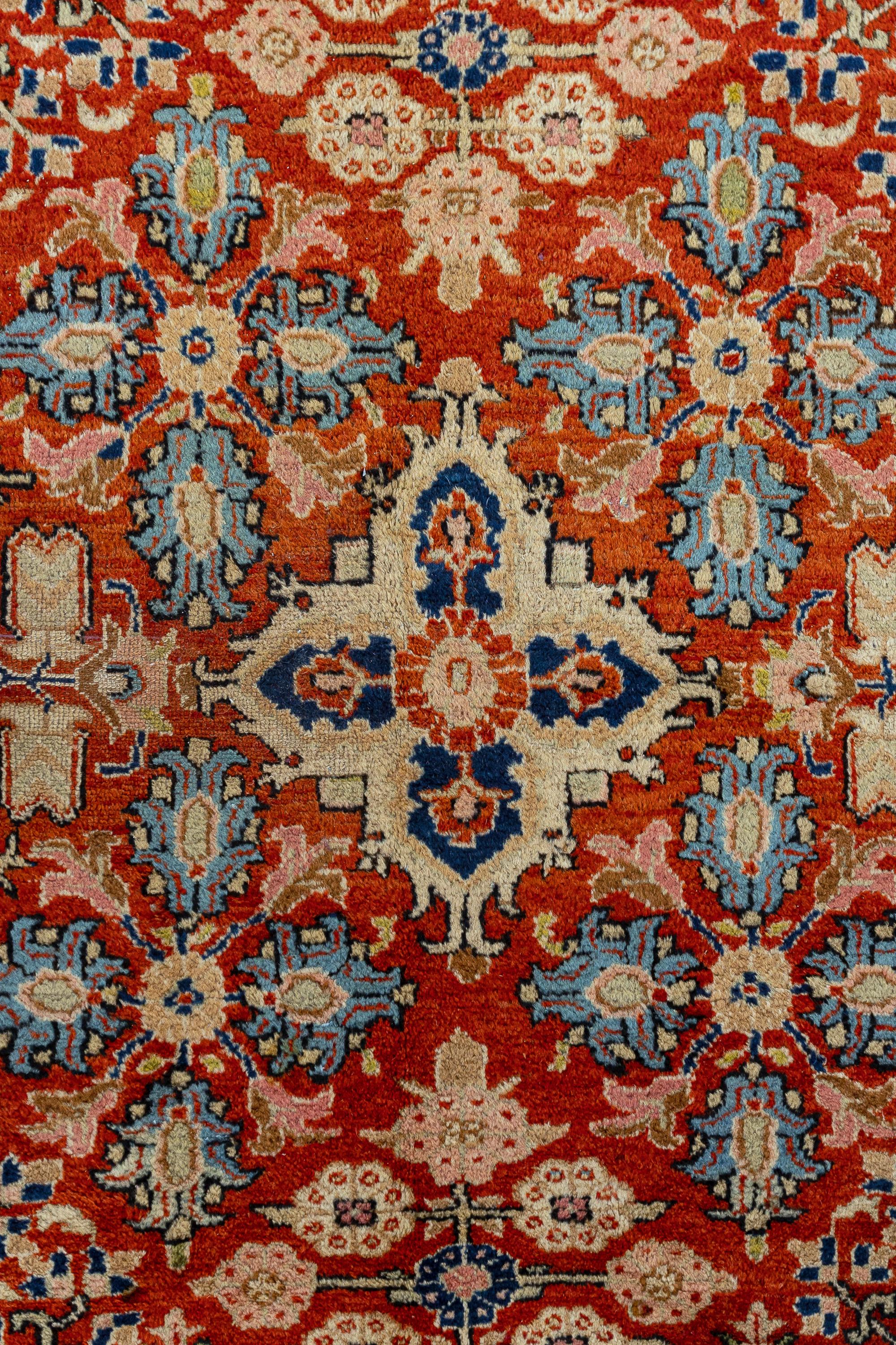 Lilihan – West Persia

Offering a rare and captivating colour combination of red, blue, and gold, this exclusive antique rug presents fantastic home decorating possibilities. The large-scale motifs scattered throughout the carpet, individually drawn