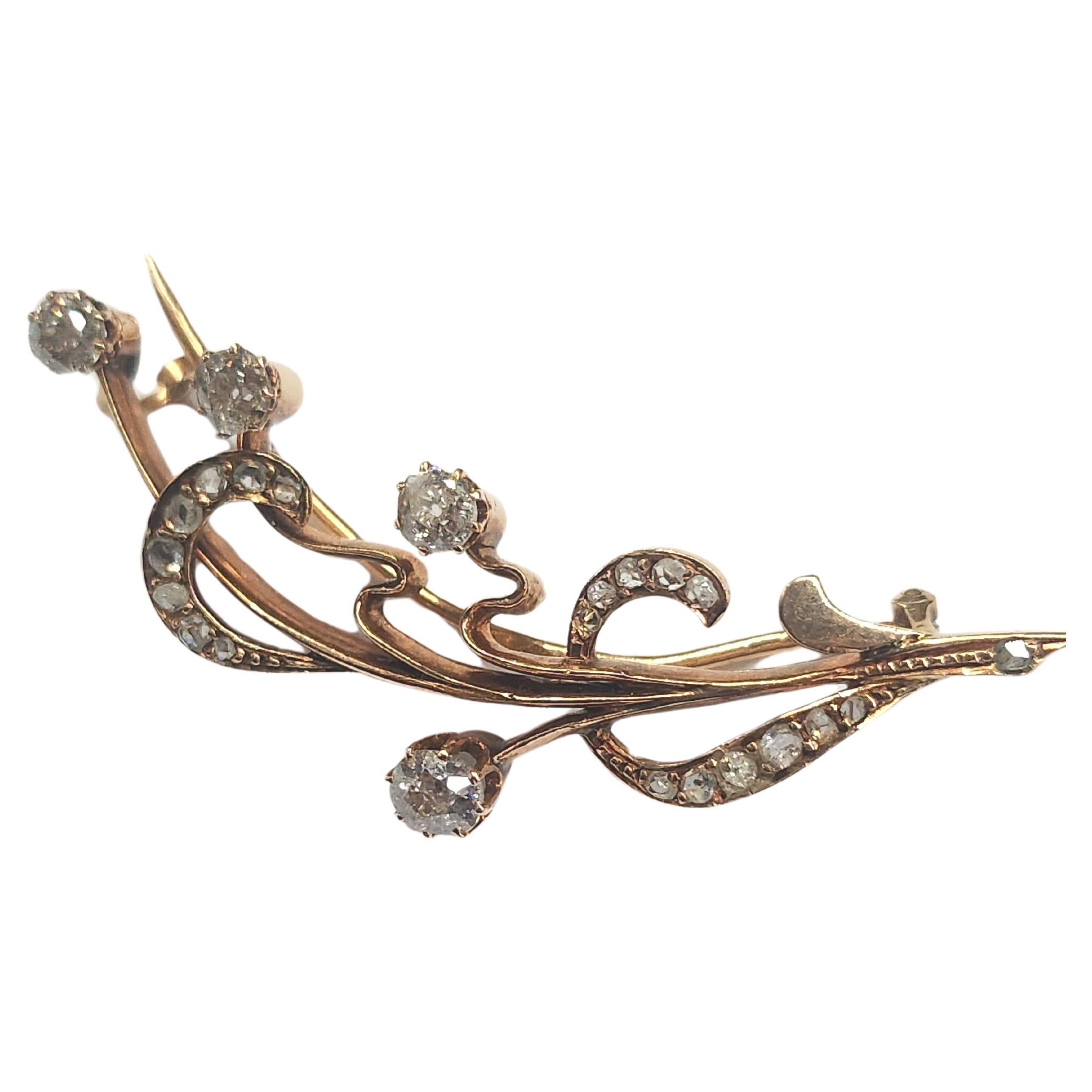 Antique imperial russian era 14k gold brooch in lily of the valley designe with estimate old mine cut diamonds weight of 1.50 carats hall marked with initial maker mark in cyrtllic alphabet and assayer mark and later with 583 gold standard 