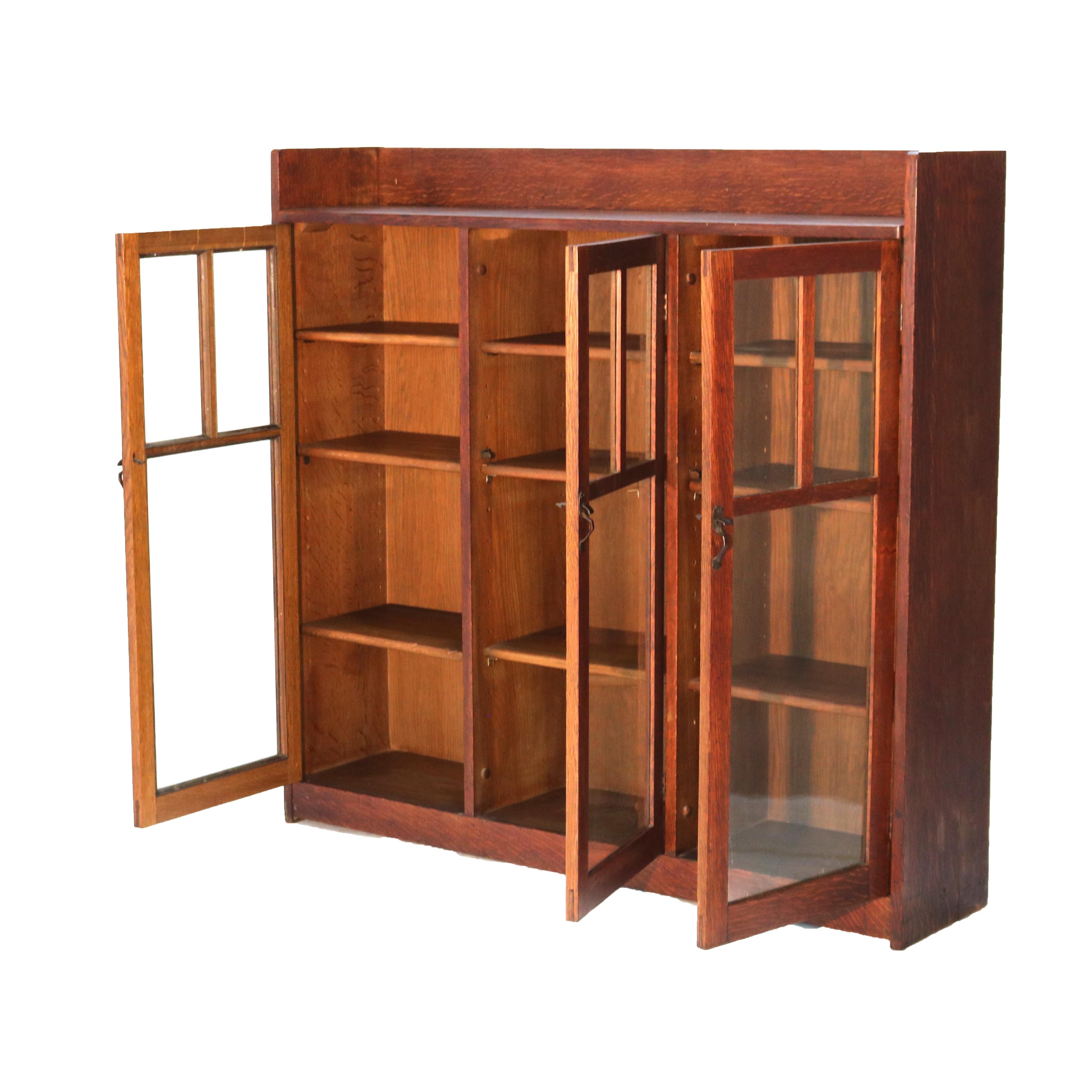 ***Reduced In-House Delivery Rates - Click on “Ask Seller” to Request a Quote***

Antique Limbert Arts & Crafts Mission Oak Three-Door Bookcase C1910

Measures - 46