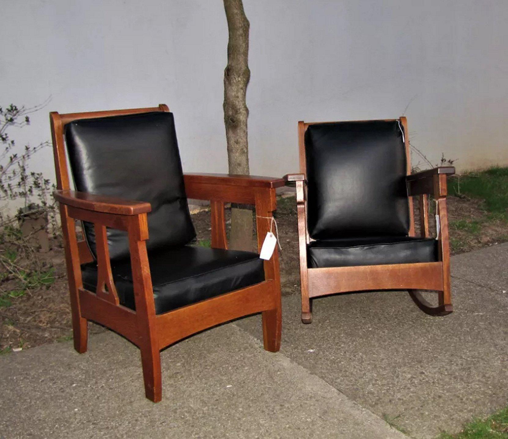 This is a very rare pair of antique Charles Limbert pieces - Chair & Rocker Set. They are signed with the Limbert mark. Made with a wonderful selection of oak. Both pieces are in mint original finish, all sharp edges and not a drop of overcoat. (You