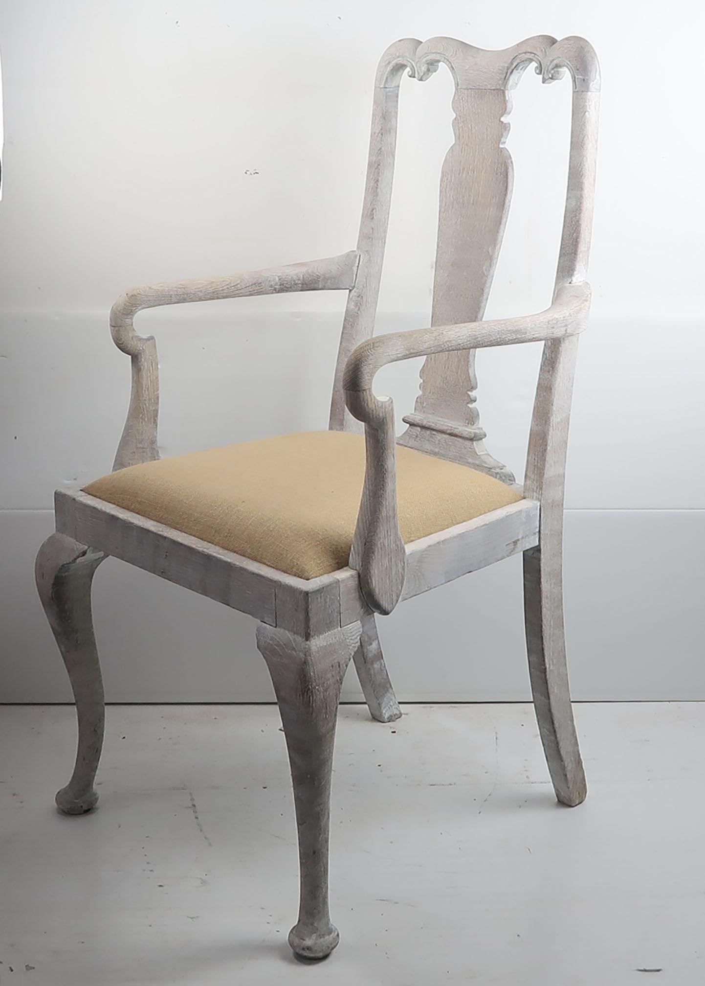 An elegant Gustavian style carver or armchair

A lovely urn shaped splat, cabriole leg and scroll detail to the top rail

It has been recently limed to enhance the beautiful grain in the wood.

The seat has been re-upholstered in hessian or