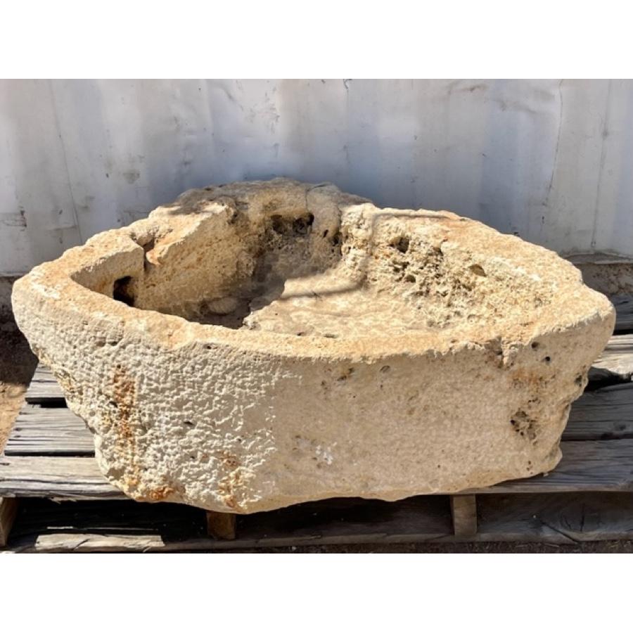 A unique pie-shaped basin would make a beautiful fountain or planter. antique and reclaimed stone shows patina and wear from years of use, and enhances the character and textural elements of this stone.