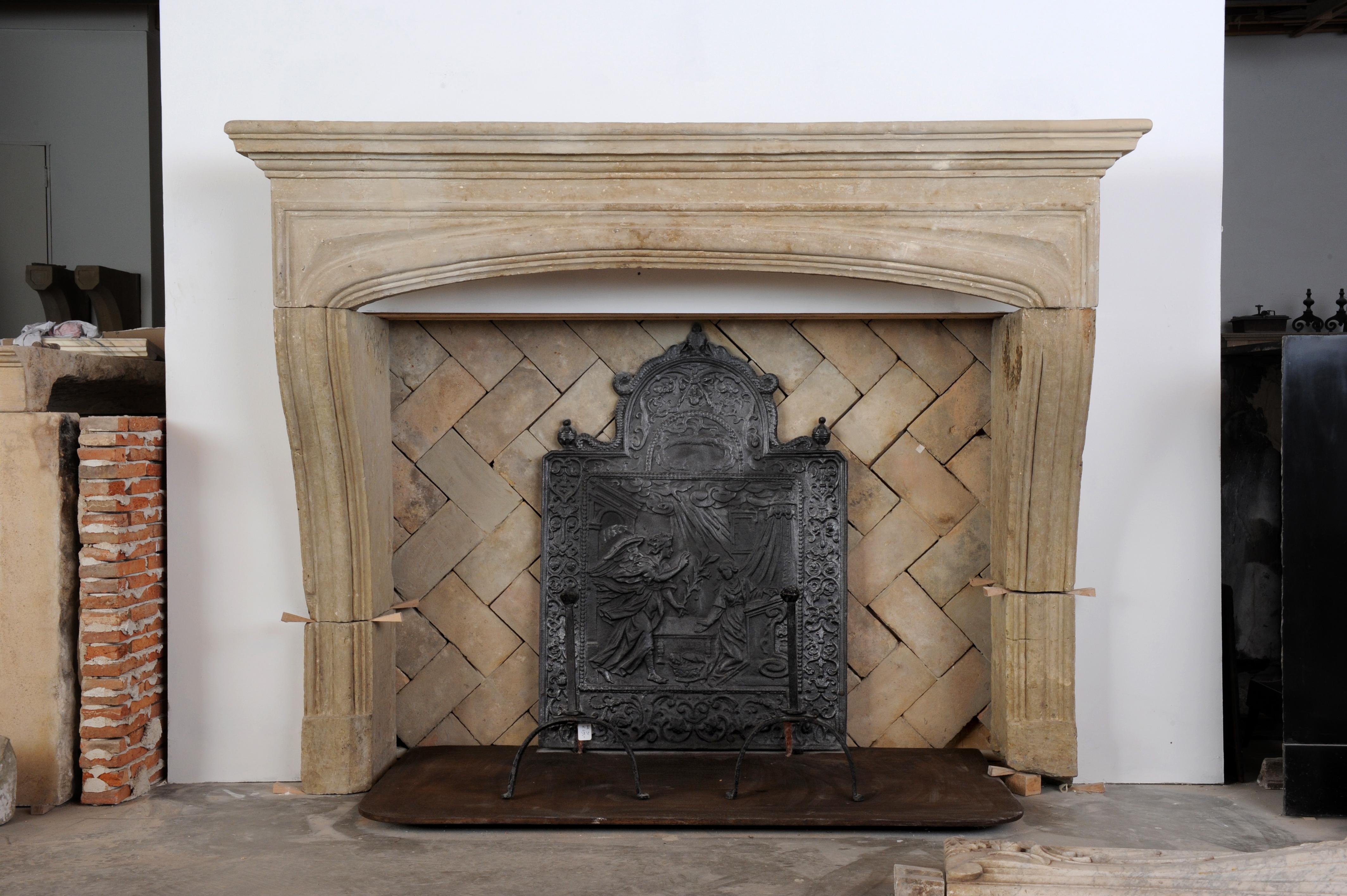 Amazing rustic French Louis XIV fireplace mantel from the 18th Century.

This strong profiled mantel comes from the center of the Bordeaux area.
Originally installed in the grand room of a nice French manor house.
We cleaned, restored and build