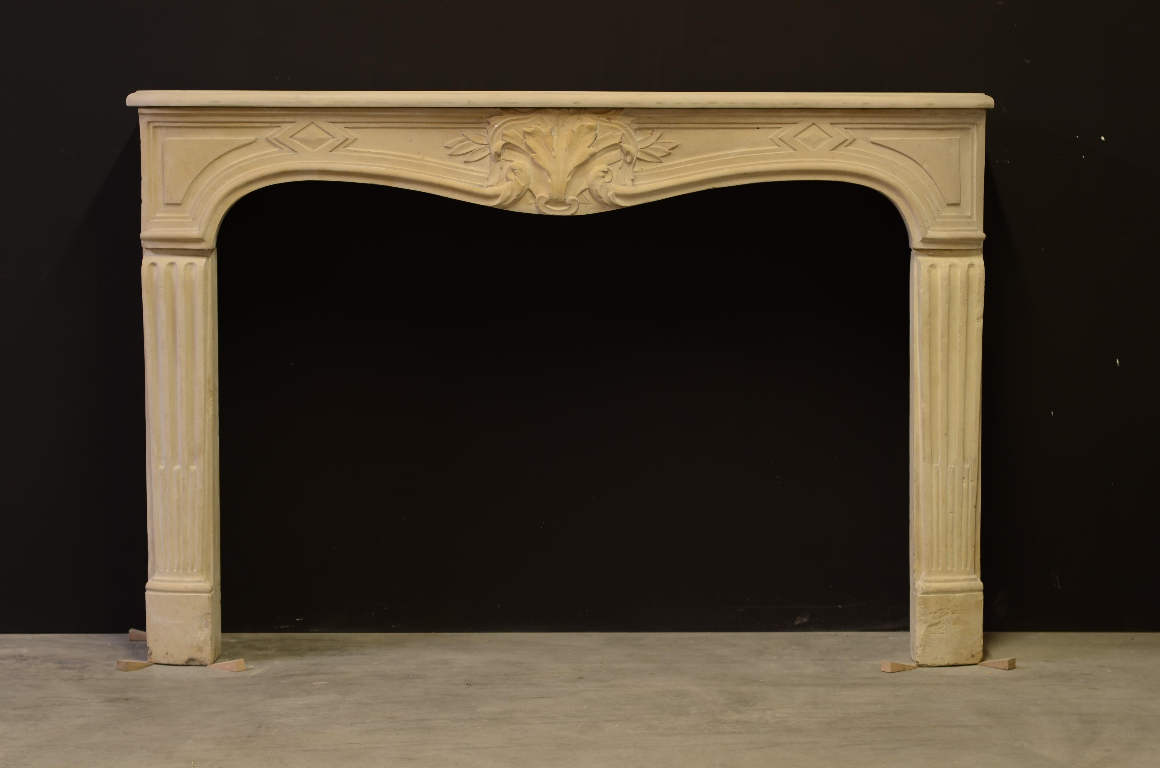 Lovely antique limestone Louis XV fireplace mantel.
Nice warm colored limestone mantel, beautifully decorated.
Sides are not original, nice patina and in overall good condition.

Sold by Schermerhorn Antique Fireplaces.