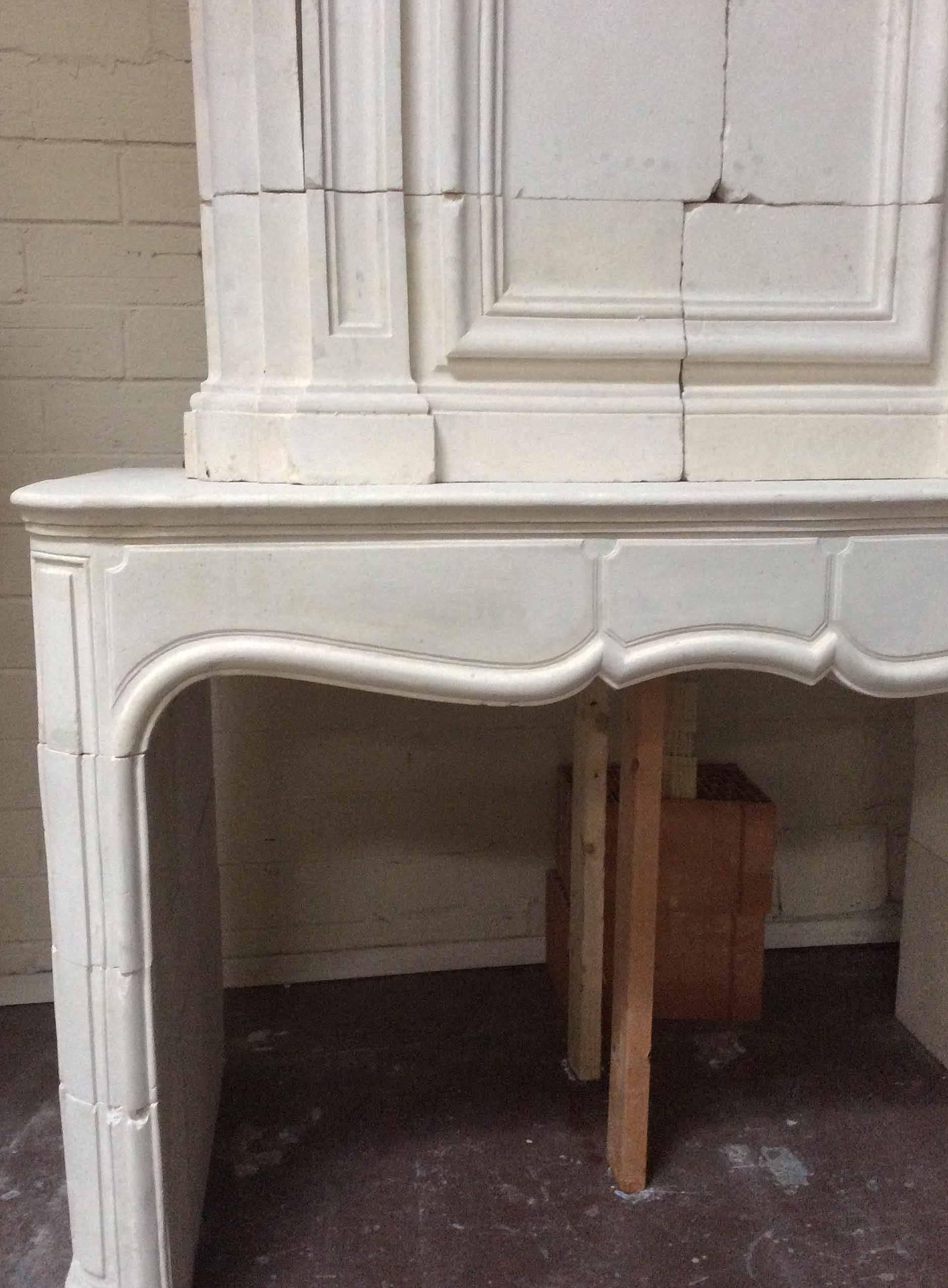 This European fireplace features a masterfully carved Trumeau and legs with a scalloped designed mantel. A wonderful piece for any living quarters.
Imported from France, circa 1750. The firebox is 50.50