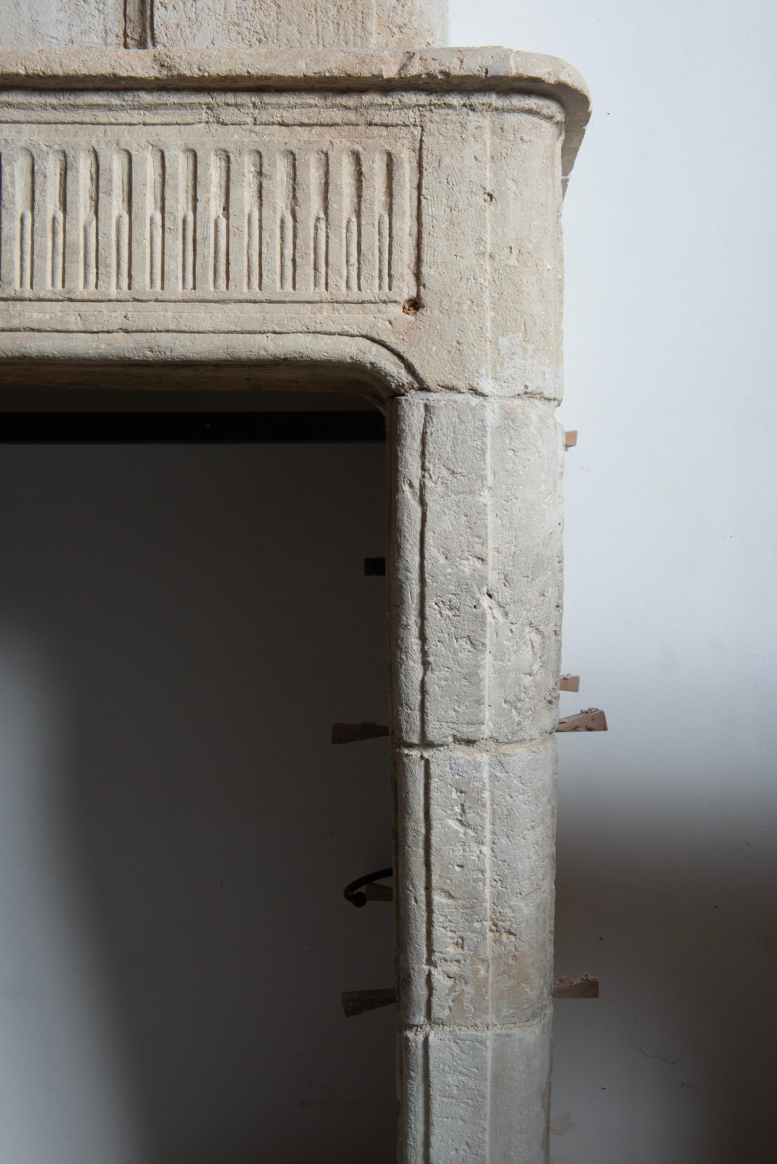 Antique Limestone Trumeau Fireplace Mantelpiece In Fair Condition For Sale In Haarlem, Noord-Holland