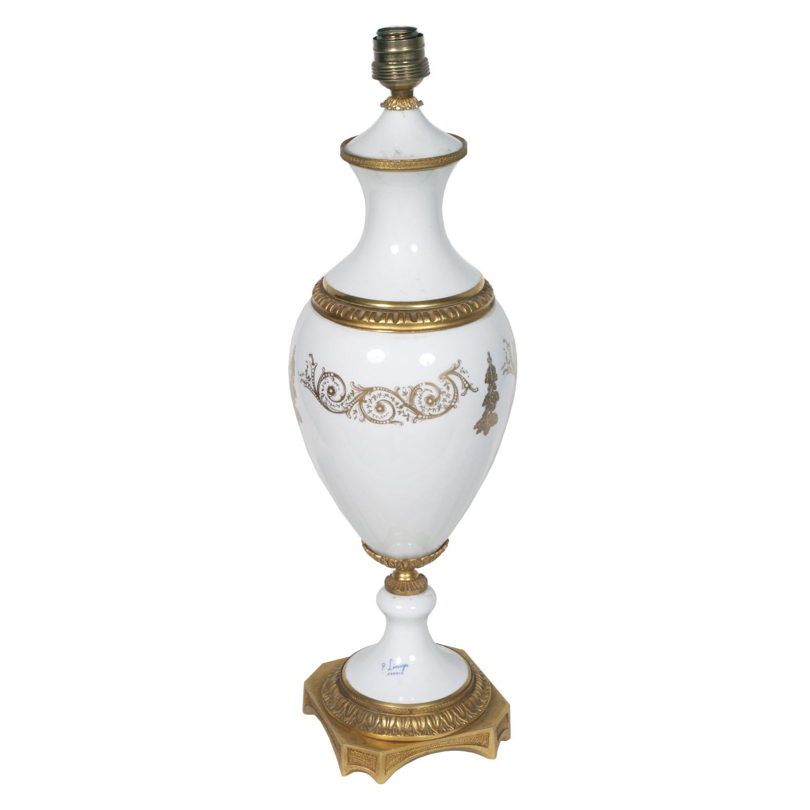 1930s French table lamp with Limoges white bisque porcelain decorated gold; rings and base in gilded bronze
Overhauled electrical system
Measures Limoges cm: H 55 diameter 20. Total height cm 85 diameter 40.


LIMOGES PORCELAIN
Limoges porcelain is
