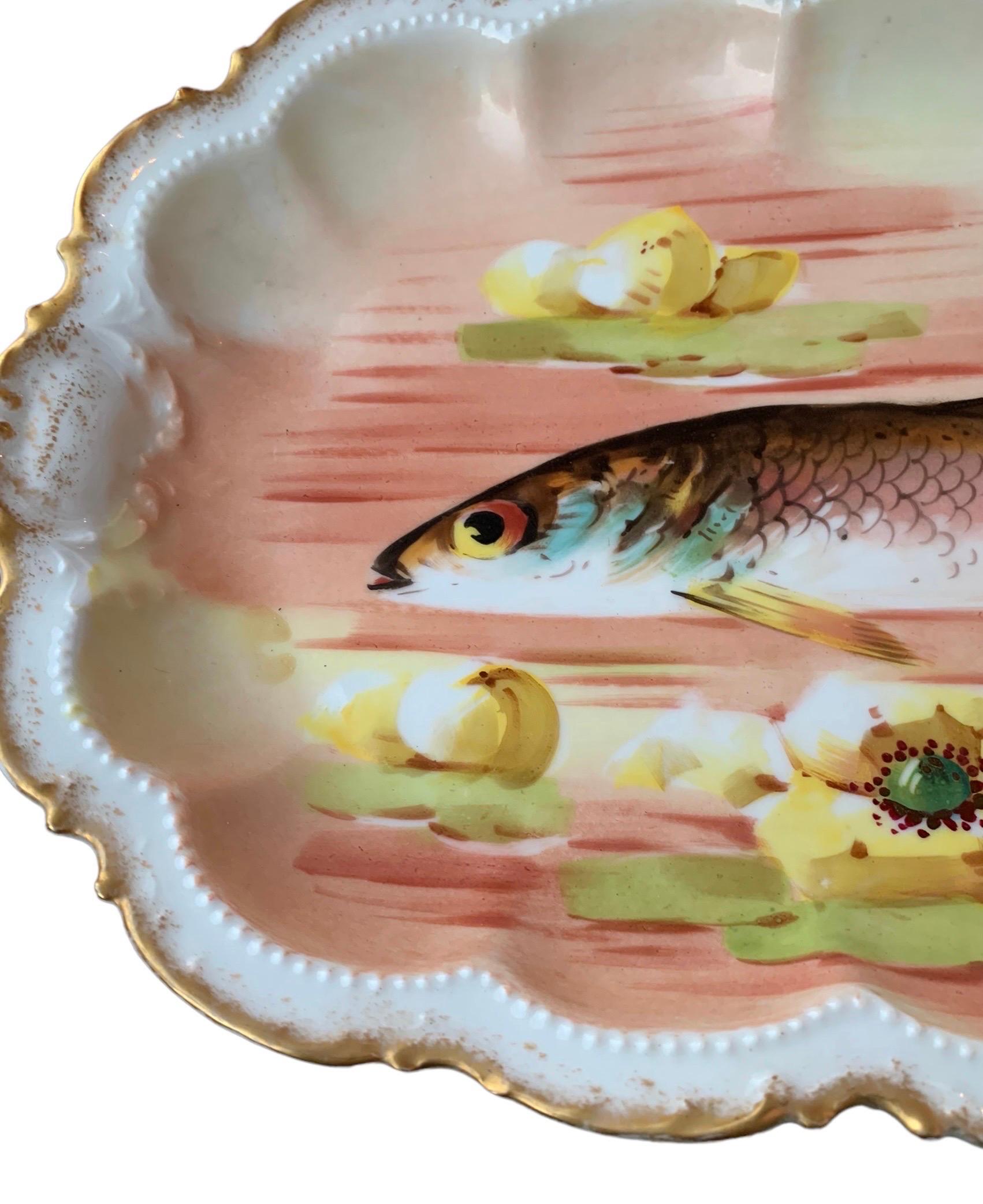 Gold Antique Limoges Fish Platter and Twelve Serving Plates For Sale