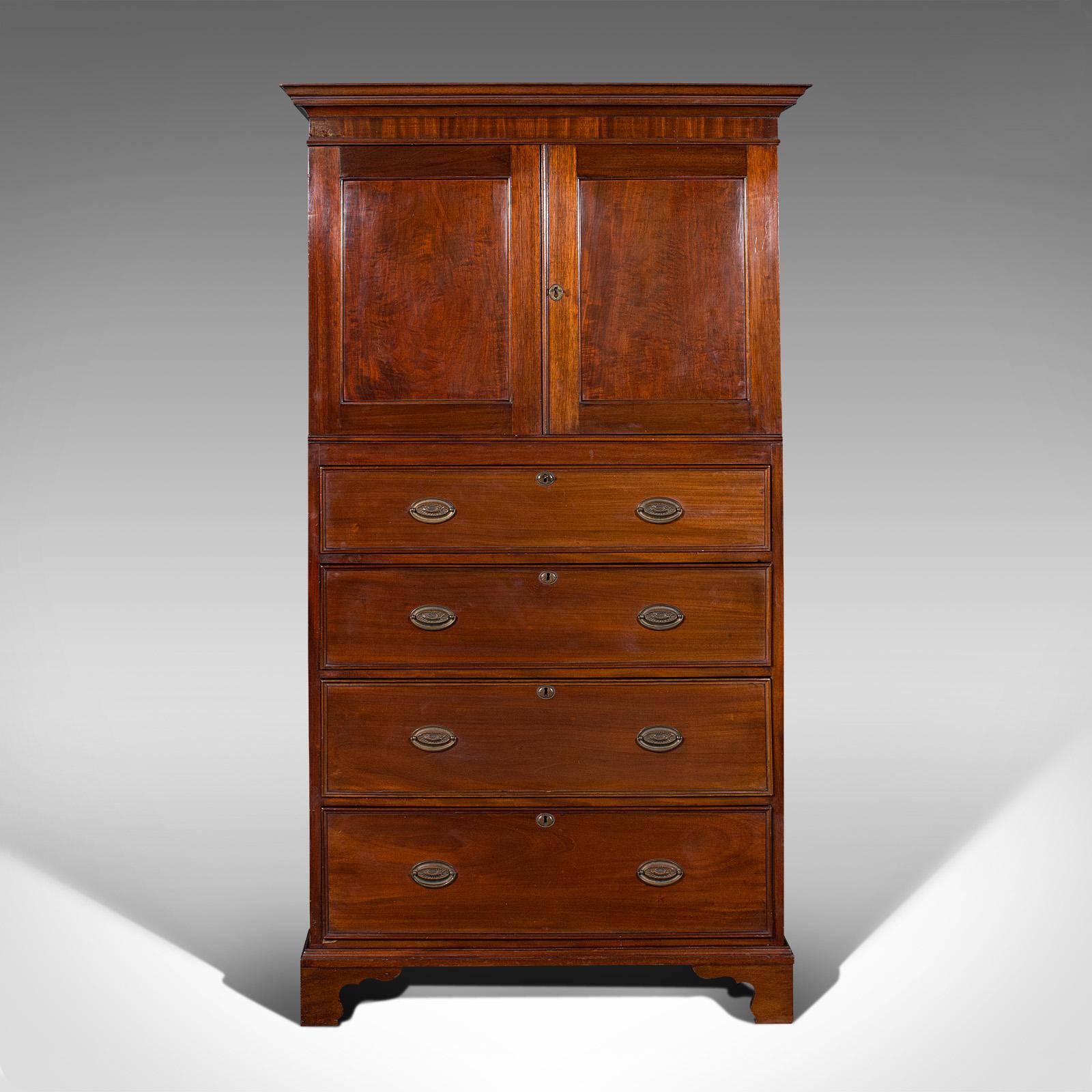 This is an antique linen press. An English, mahogany bedroom tallboy cabinet with chest of drawers below, dating to the late Victorian period, circa 1900.

Beautifully presented cabinet of usefully narrow proportion
Displays a desirable aged