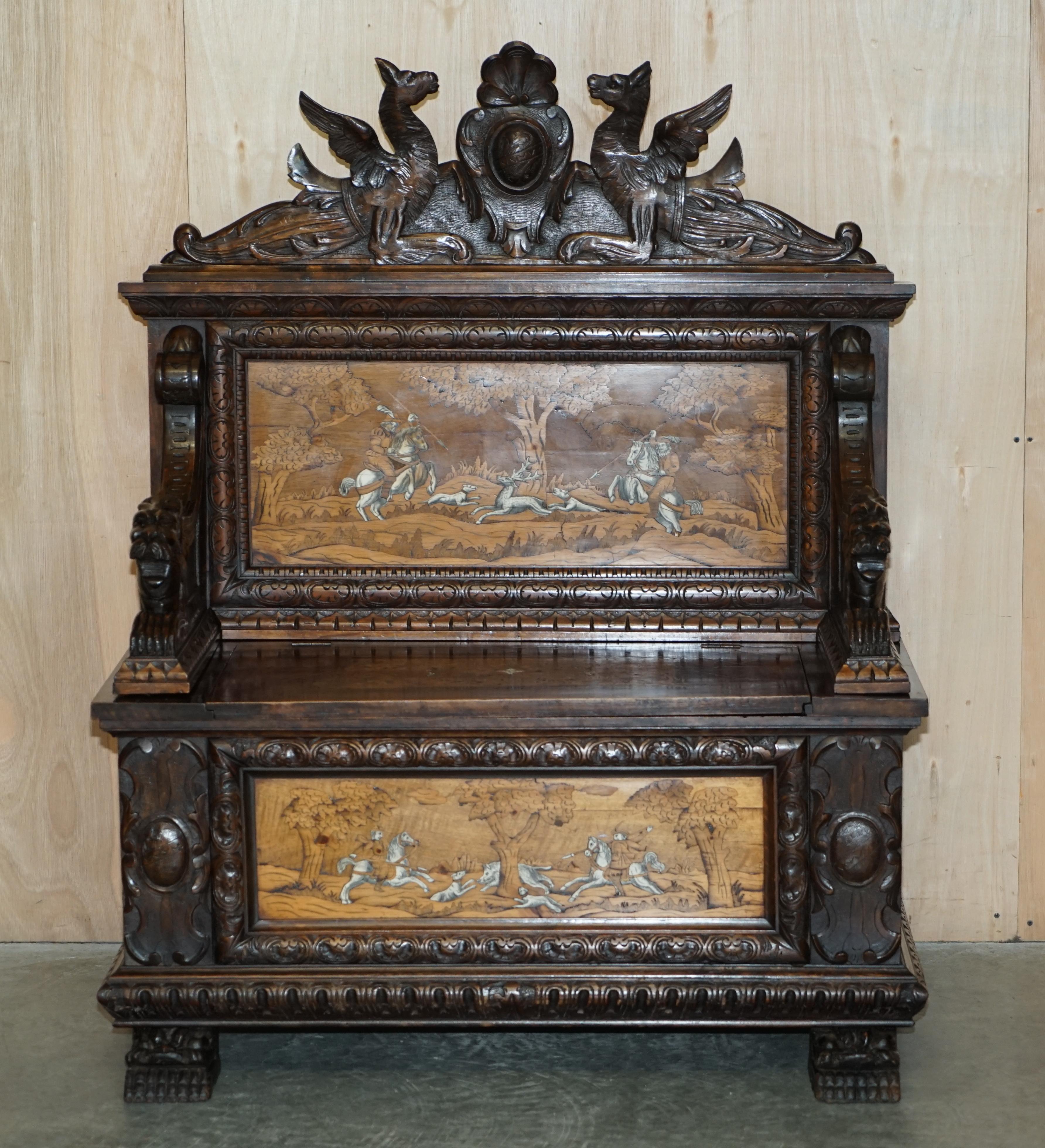 We are delighted to offer for sale this stunning hand carved circa 1860 Monks oak settle bench with internal storage from the north of Italy depicting Lions, Griffons, and a coat of arms with hunting scenes to the back and base

A very good