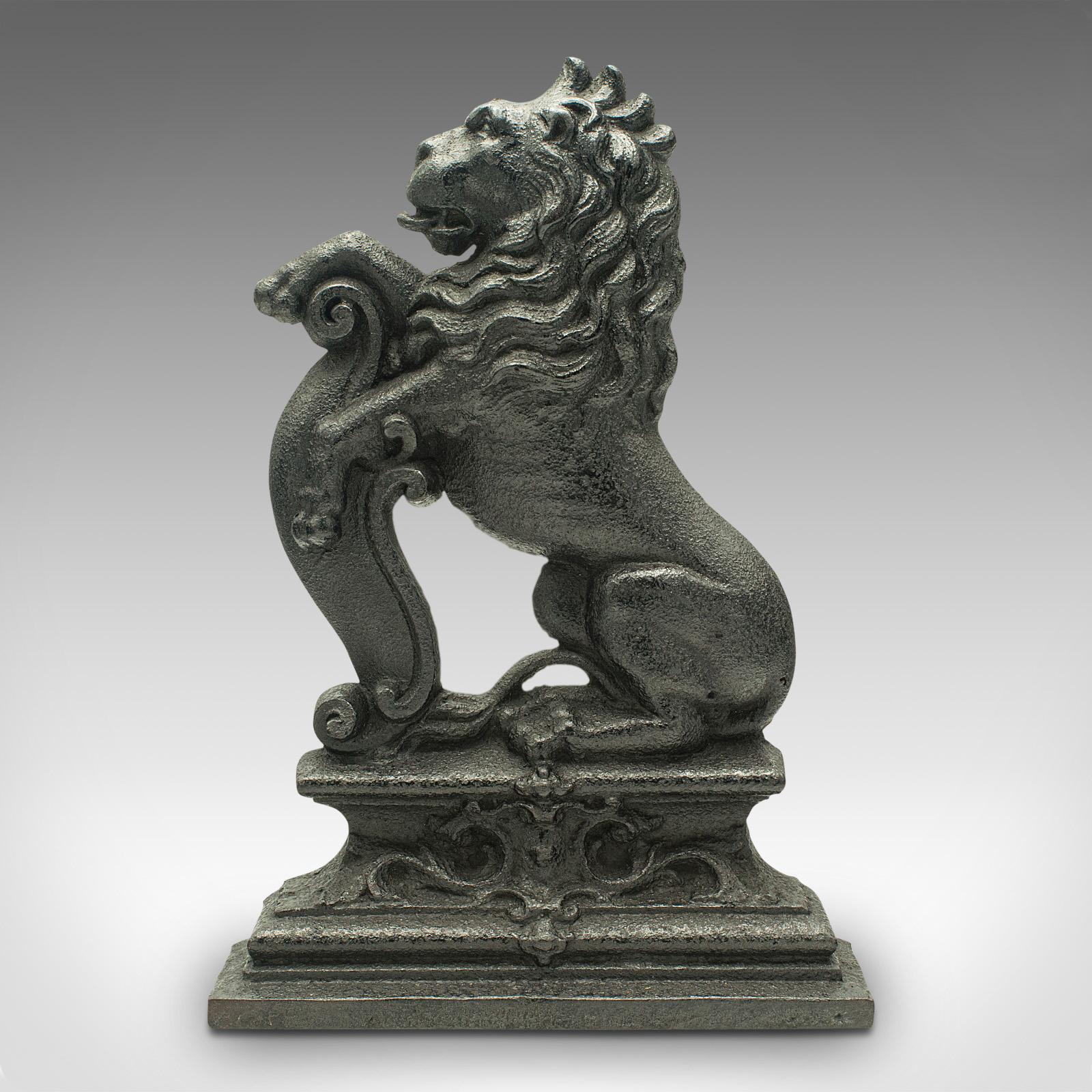 This is an antique Lion Rampant doorstop. An English, cast iron decorative heraldic door keeper, dating to the Victorian period, circa 1870.

Robust and generously sized, with iconic lion form
Displays a desirable aged patina and in good