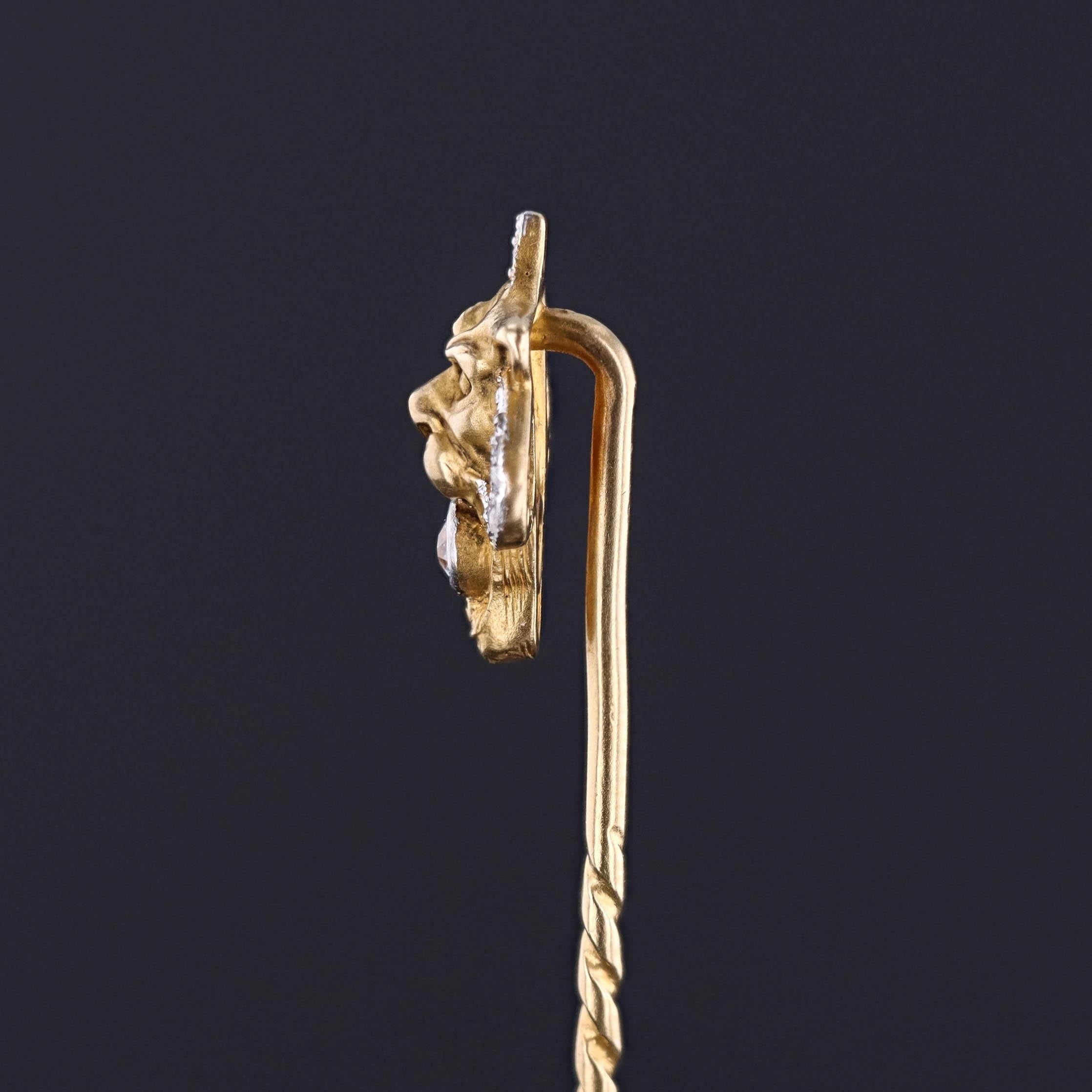 An antique stickpin from 1890-1900, featuring a lion of 14k gold and platinum with diamonds.

The pin head measures 0.55 inches by 0.5 inches wide with the entire pin measuring 2.7 inches long and weighs 2.8 grams. It is in great condition.

The