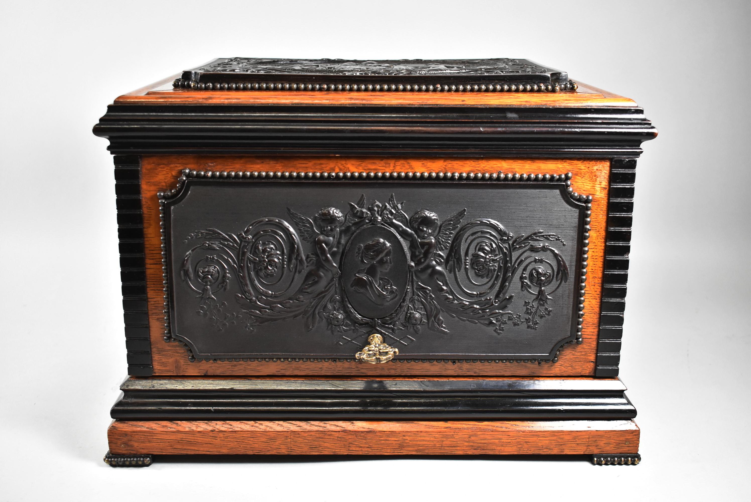 Antique liquor tantalus box of oak with guta percha images. 14 3