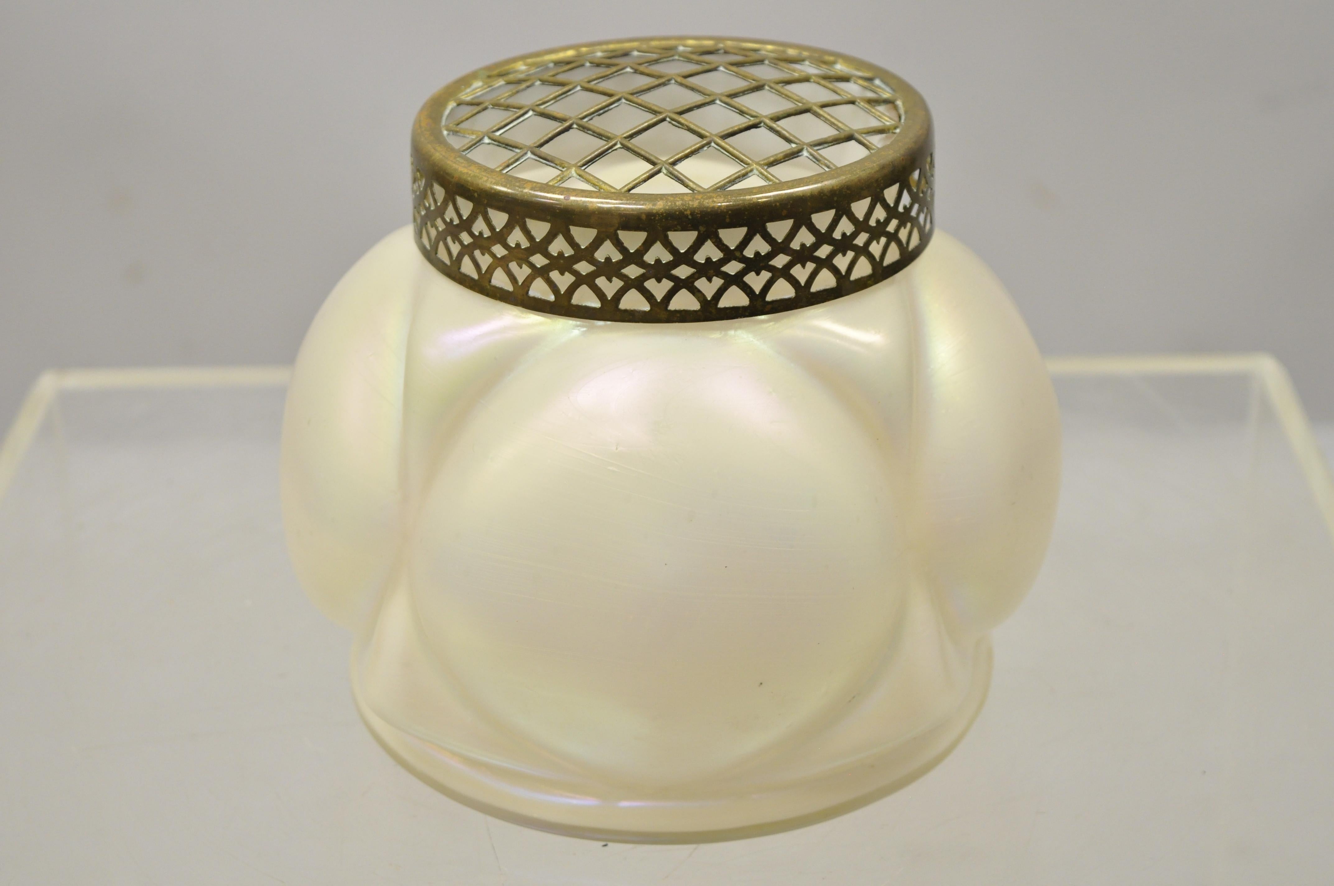 Antique Loetz art glass Iridescent flower vase Arranger brass lid potpourri jar. Item features a bulbous art glass iridescent vase, brass grid lid, nice impressive size, circa 19th century. Measurements: 6.5