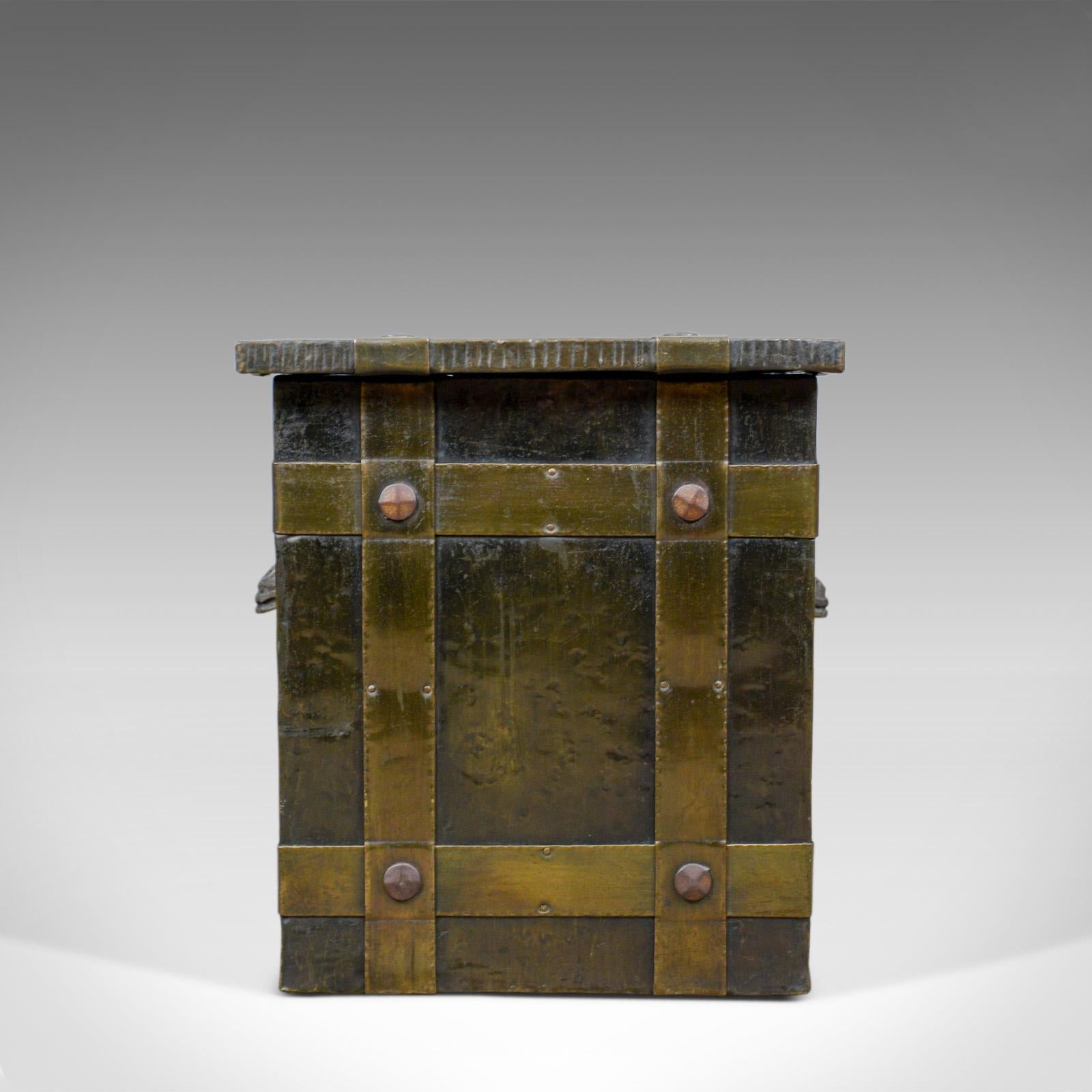 This is an antique log bin. An Edwardian, bound metal, fireside box with Arts & Crafts overtones dating to the early 20th century, circa 1910.

A pleasing mid-size fireside storage bin 
Presented in good antique condition

Arts & Crafts