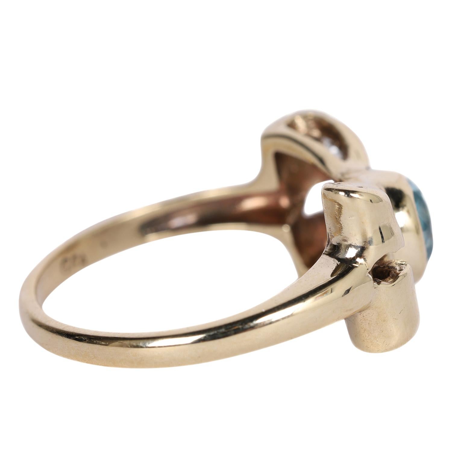 Antiguo anillo LONDON de topacio azul y nudo de diamantes Corte redondo en venta