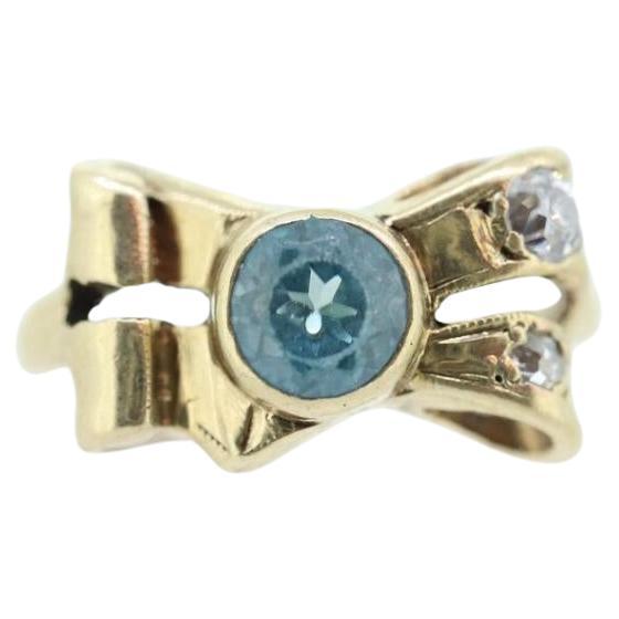 Antique LONDON Blue topaz and Diamond ring. Bezel Topaz and Diamond Bow Knot
