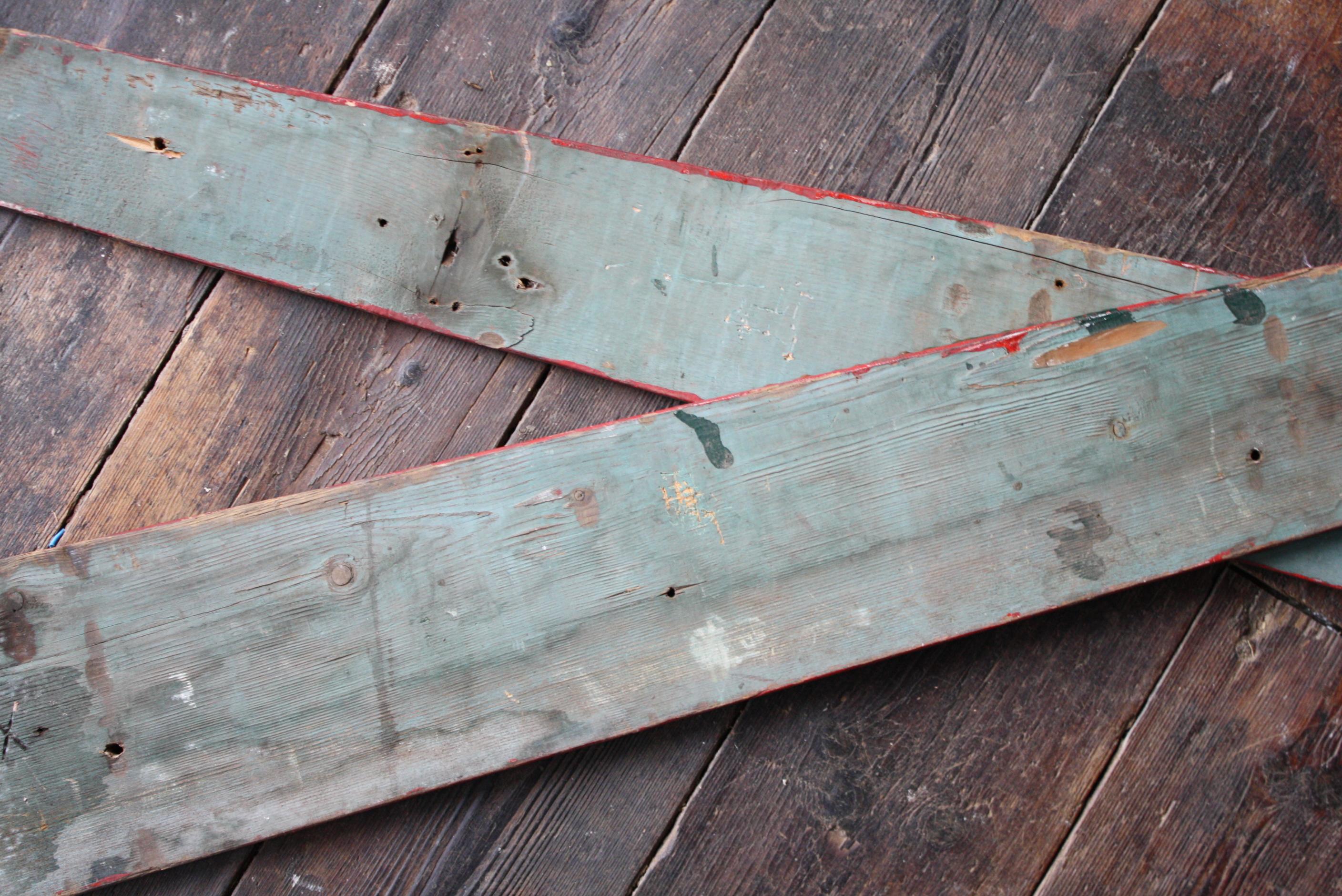 A decorative pair of trade signs for J B Thomas of either Borough Market or Covent Garden London, a red ground with gilt/yellow hand painted lettering.

Pine in construction. Age related wear circa 1900 in age

Measures: 137cm in length, 17.5cm