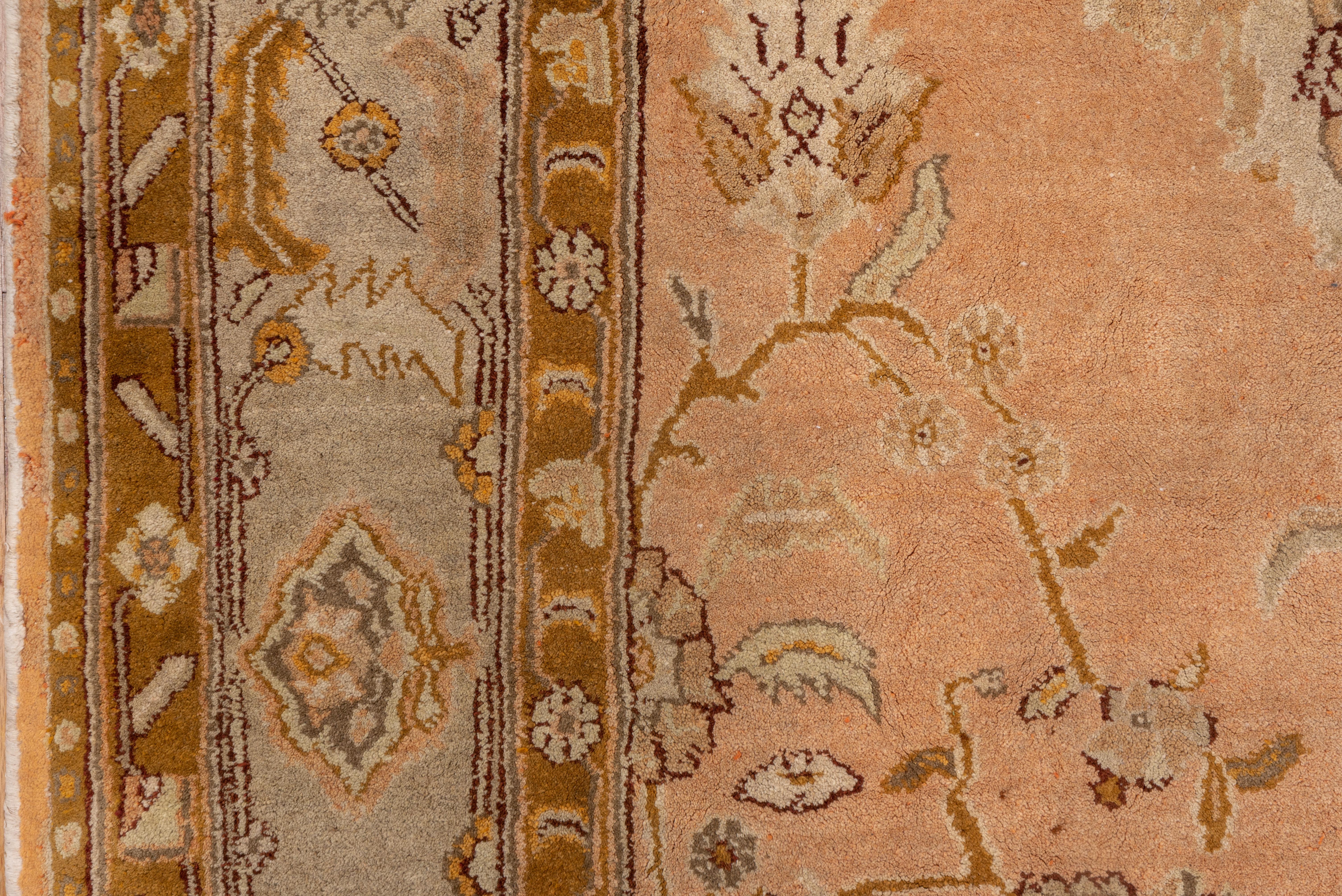 Hand-Knotted Antique Long Agra Rug, Peach Field, circa 1910s For Sale