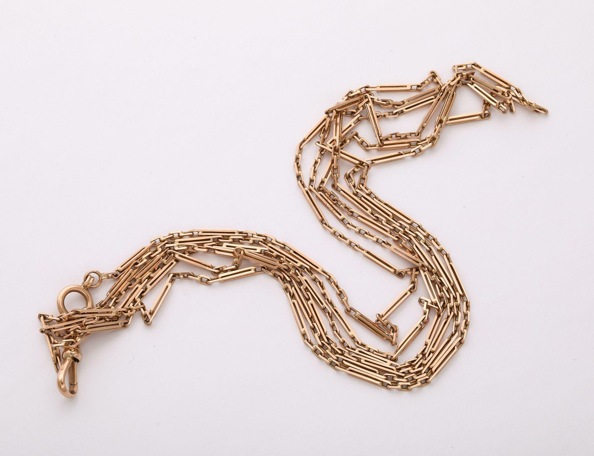This Longuard 14k watch chain with trombone links and original dog clip is 60