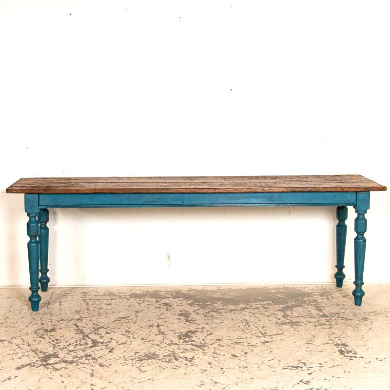 For those who search for a genuine European country farm table this 7 1/2' blue painted harvest table is a special find. The wonderful, age-distressed blue paint of the base and turned legs is all original, and is complimented by the incredible pine