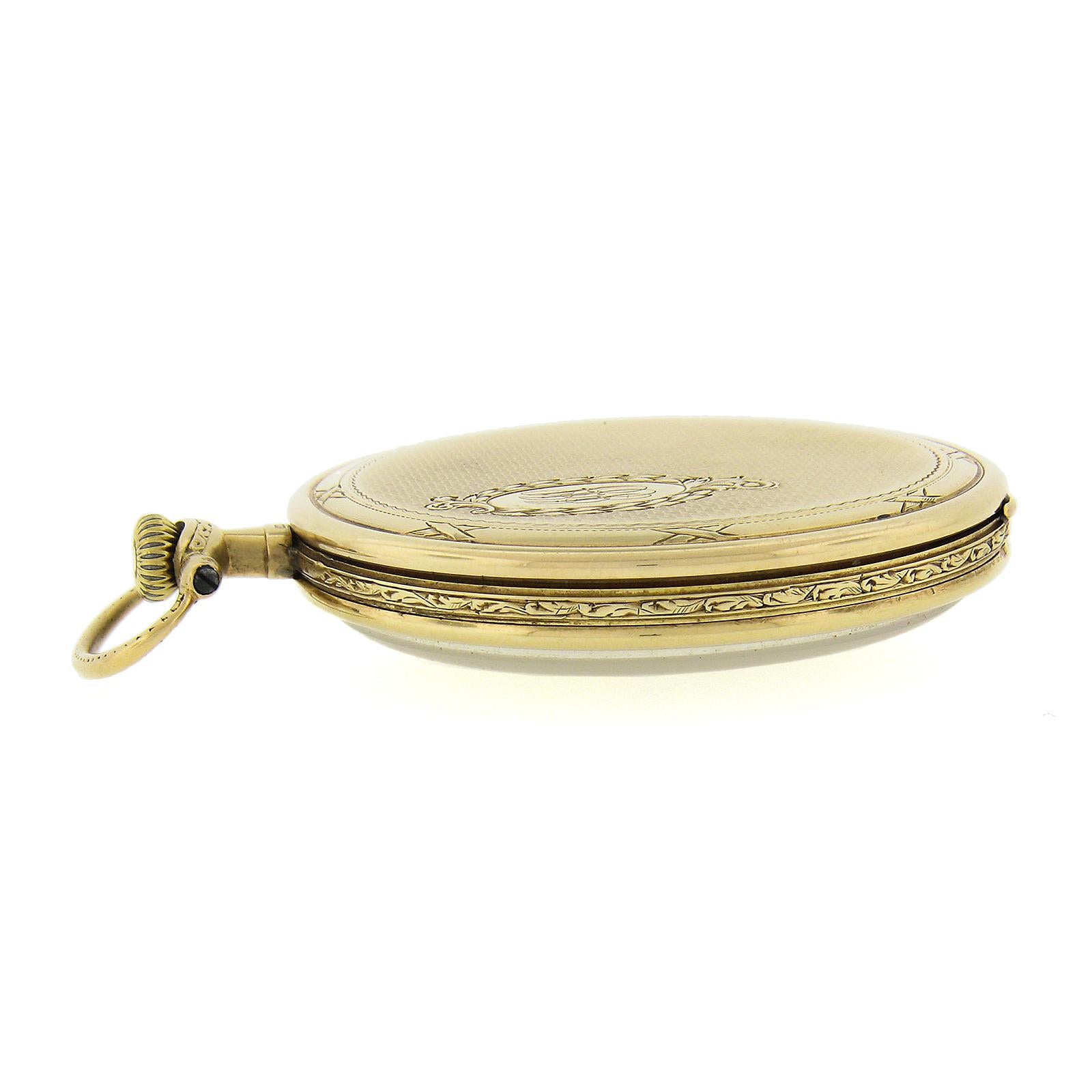 Antiguo reloj de bolsillo Longines suizo de oro amarillo de 14 quilates de 44 mm con esfera abierta detallada en venta 1