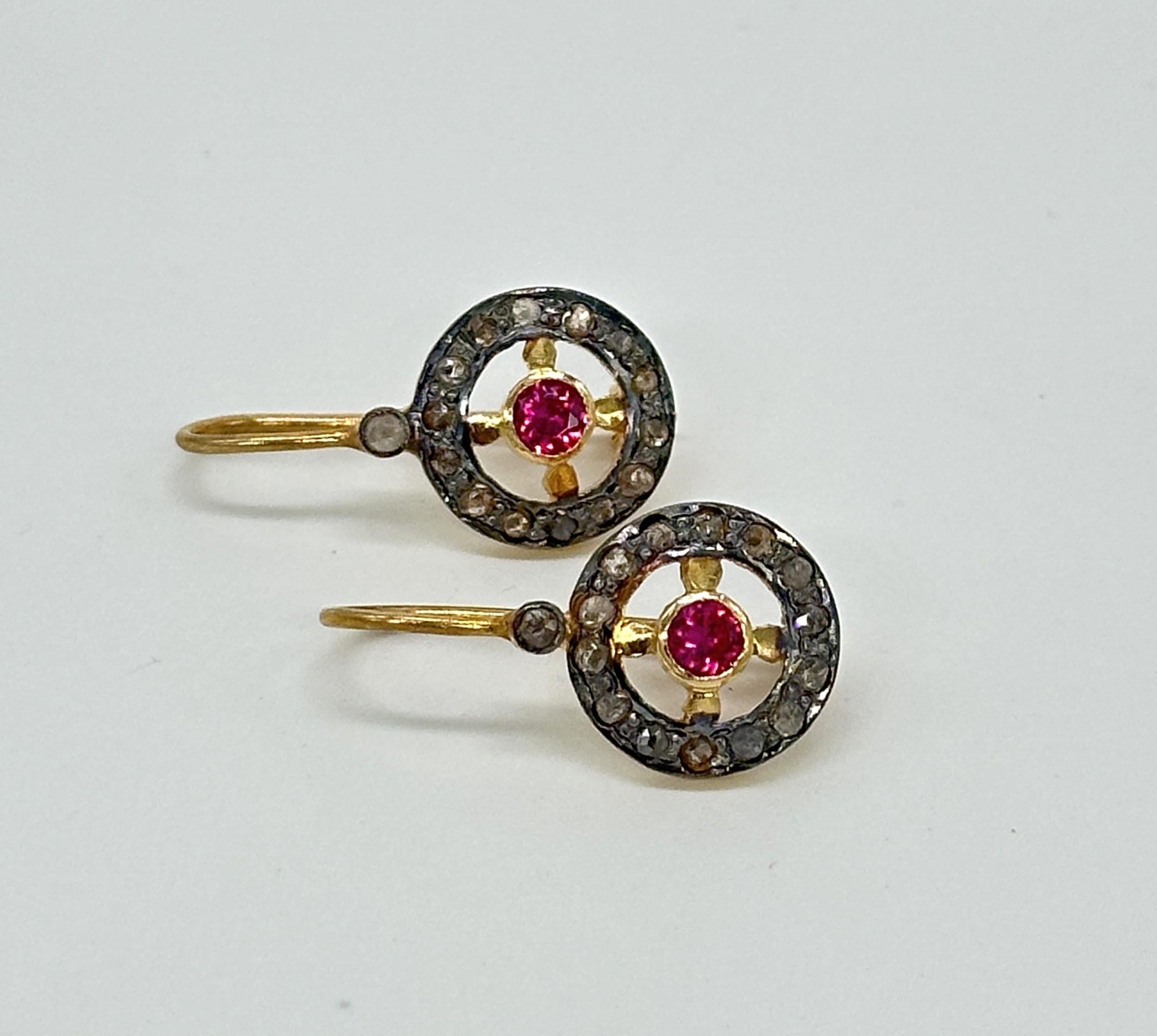 This pair of beautiful earrings consists of:

Diamond type- Rose cut diamonds
Diamond color- champagne color diamonds
Diamond origin- Natural
Metal- Silver
Metal purity- 925 silver or sterling silver
Metal color- Oxidized finish and yellow gold