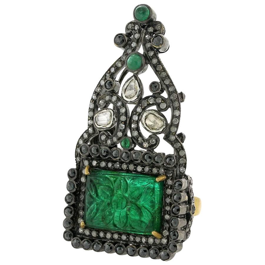 Antique Looking Carved Emerald Ring with Black and White Diamonds For Sale