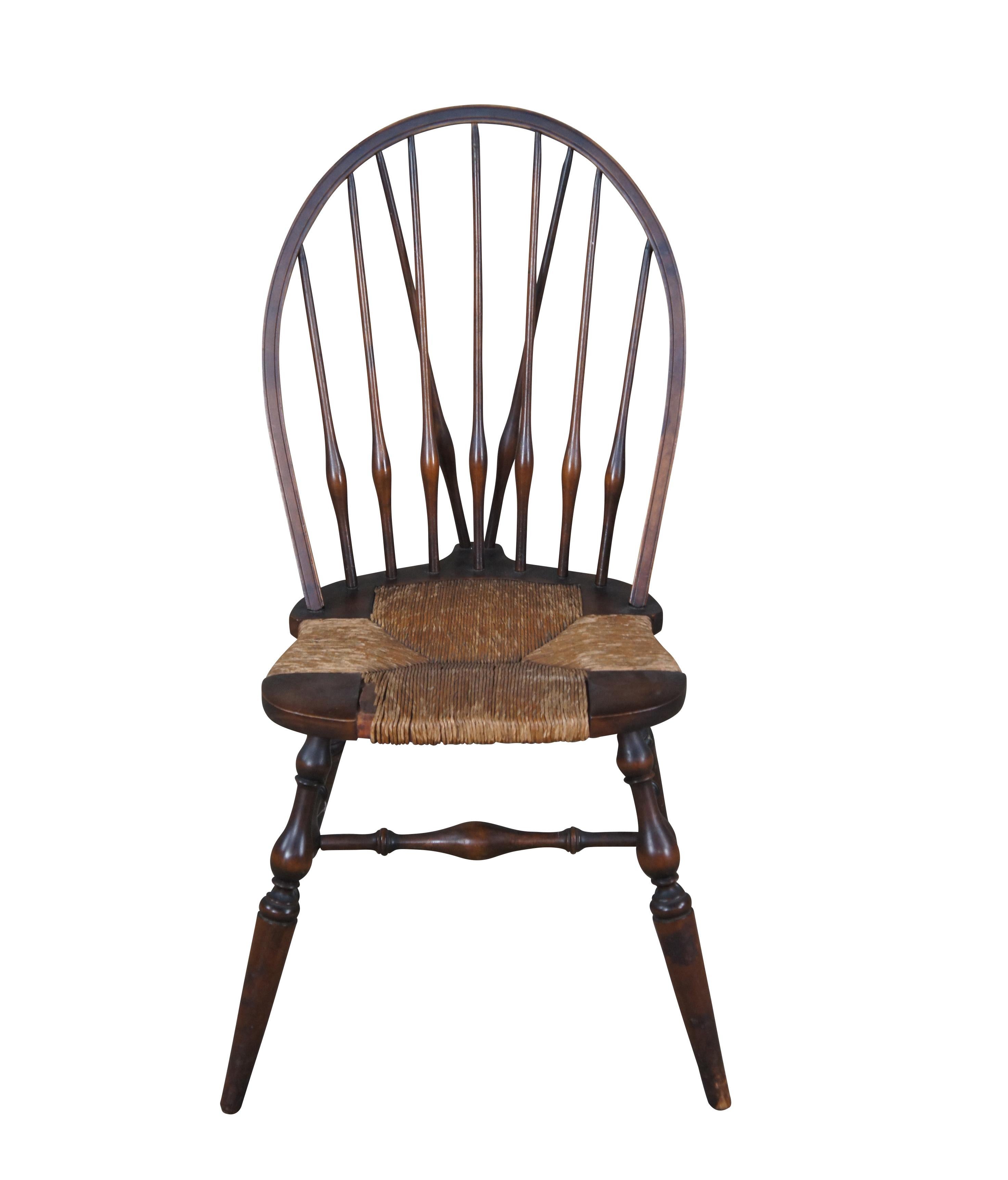 Rare antique Lord & Taylor Windsor farmhouse chair featuring a bentwood slat back with rush seat and turned supports.

Lord & Taylor of New York was the oldest surviving brick-and-mortar department store chain in the United States. In business