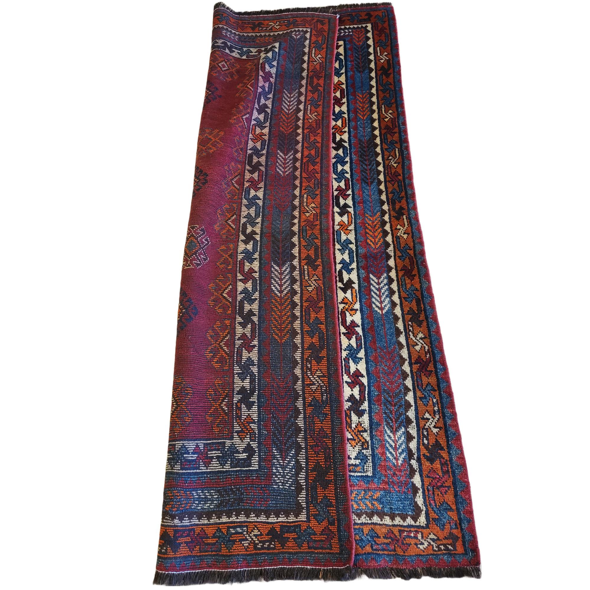 Beautiful 6'9x4'6 antique Persian Lori.

Made from Persian wool raised, sheared, dyed, spun and woven by the famous Lori tribe. Produced all while hiking with their flock up and down the country side.

Utilizing ancient weaving techniques that