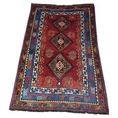 Ancien tapis persan nomade Lori