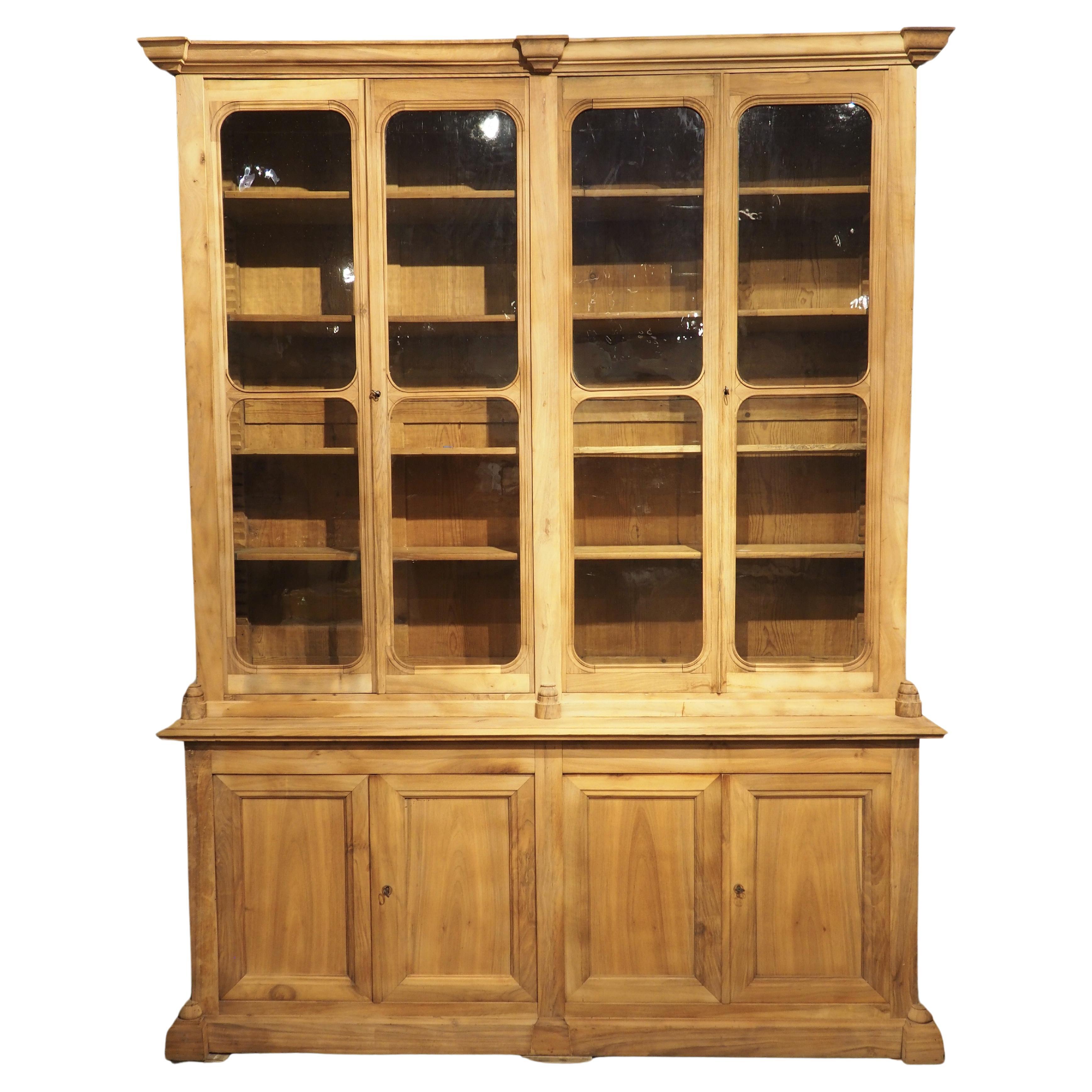 Antique Louis Philippe Bibliothèque in Stripped Walnut, Original Glass, C. 1850 For Sale