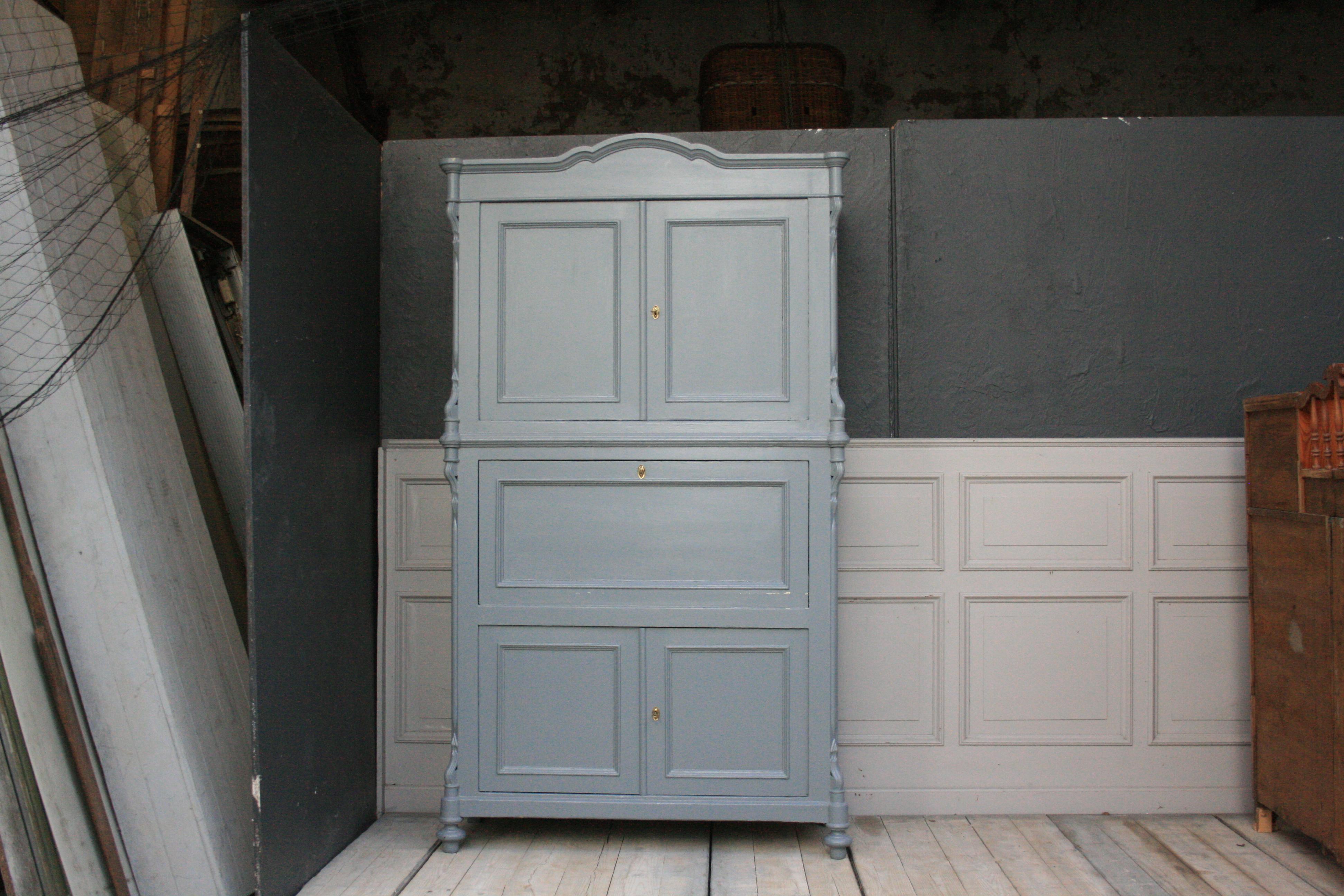 Antique Louis Philippe kitchen secretary, repainted from outside by hand. Color outside: bright gray; Color inside: dark green. 2 doors at the top and 2 doors at the bottom, each with a shelf. In the middle the writing flap with 7 small drawers and