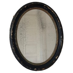 Antique Louis Philippe Oval Mirror in Black and Gold France Late 19th Century
