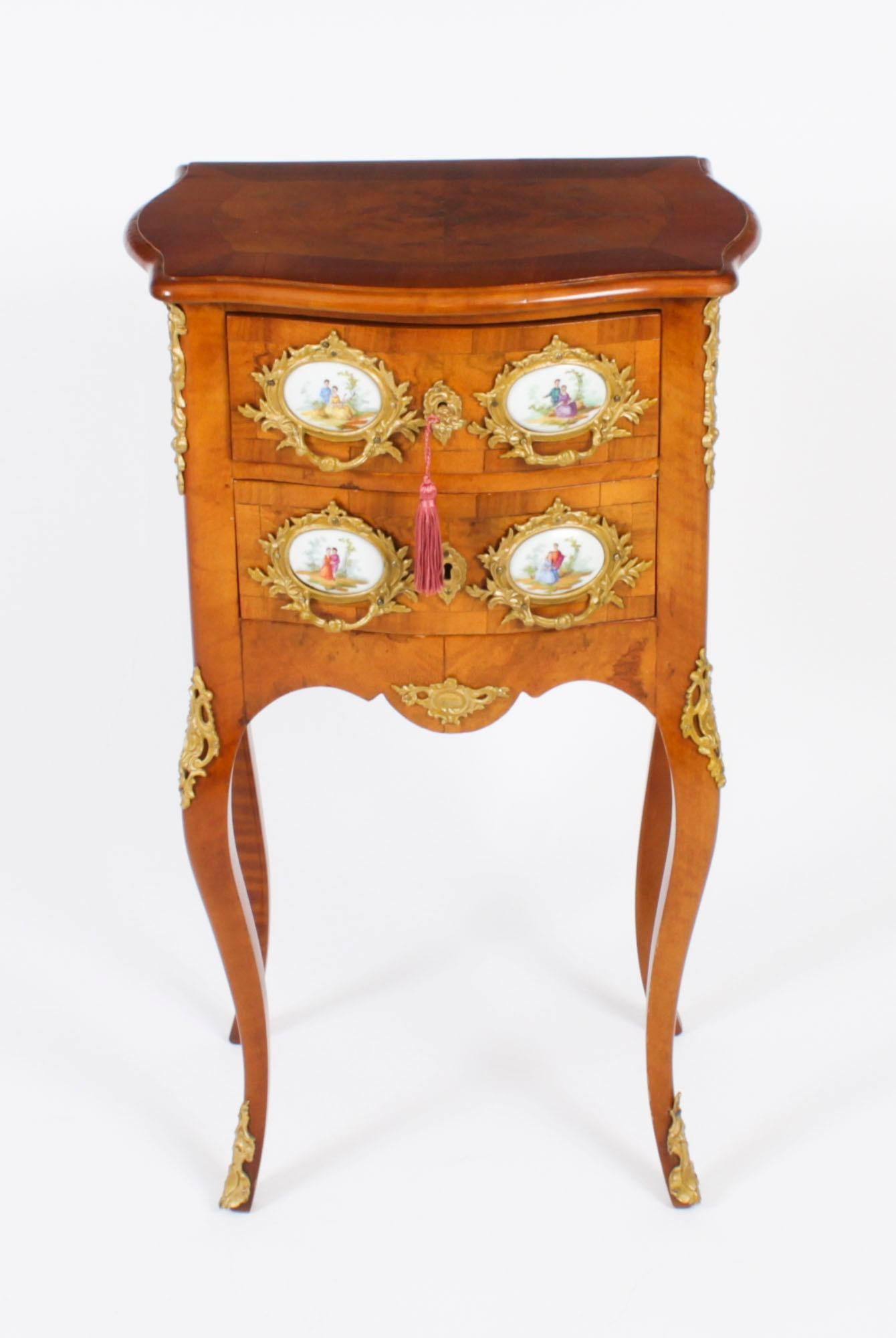 A stunning antique Louis Revival small serpentine fronted burr walnut two drawer chest, Circa 1890 in date.
Crafted from the most beautiful burr walnut with crossbanded decoration and ormolu mounts. It has stunning ornate foliate ormolu handles with