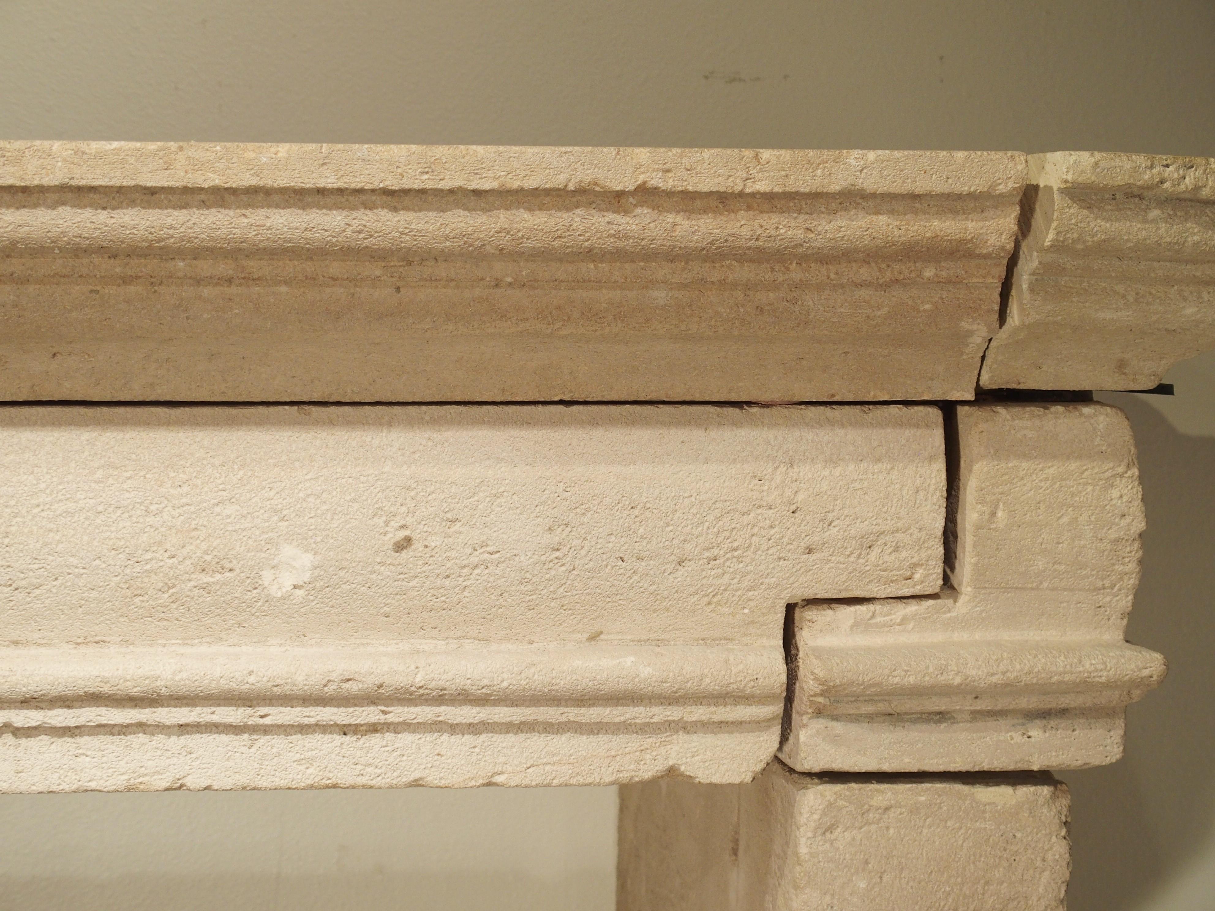 This elegant antique French carved limestone mantel exhibits a simplistic yet important style that is characteristic of fireplaces in the early 1600s, the period was that of Louis XIII, when the country was entering an era of prosperity. It’s the