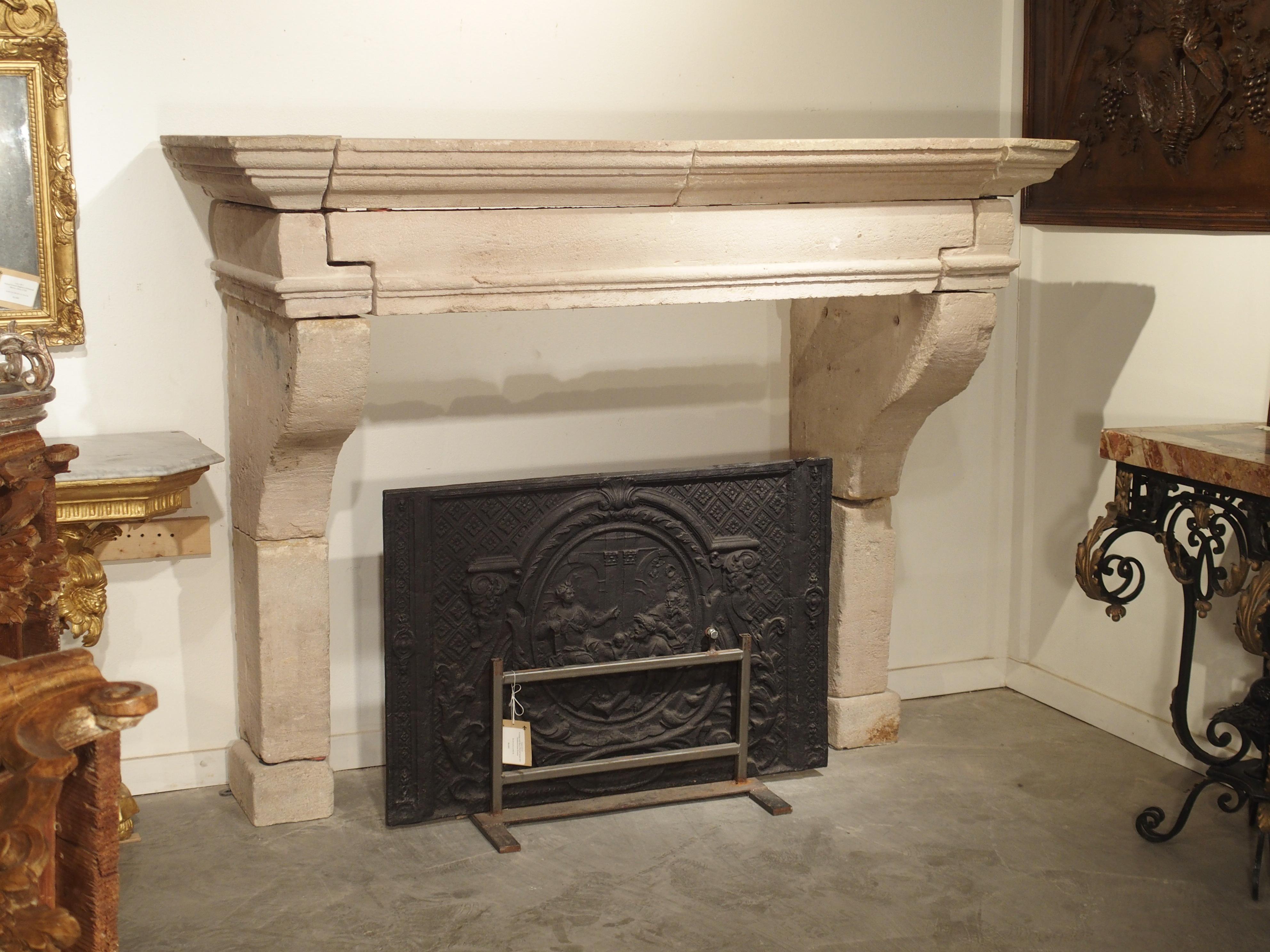 18th Century Antique Louis XIII Style Limestone Fireplace Mantel from the Loire Valley