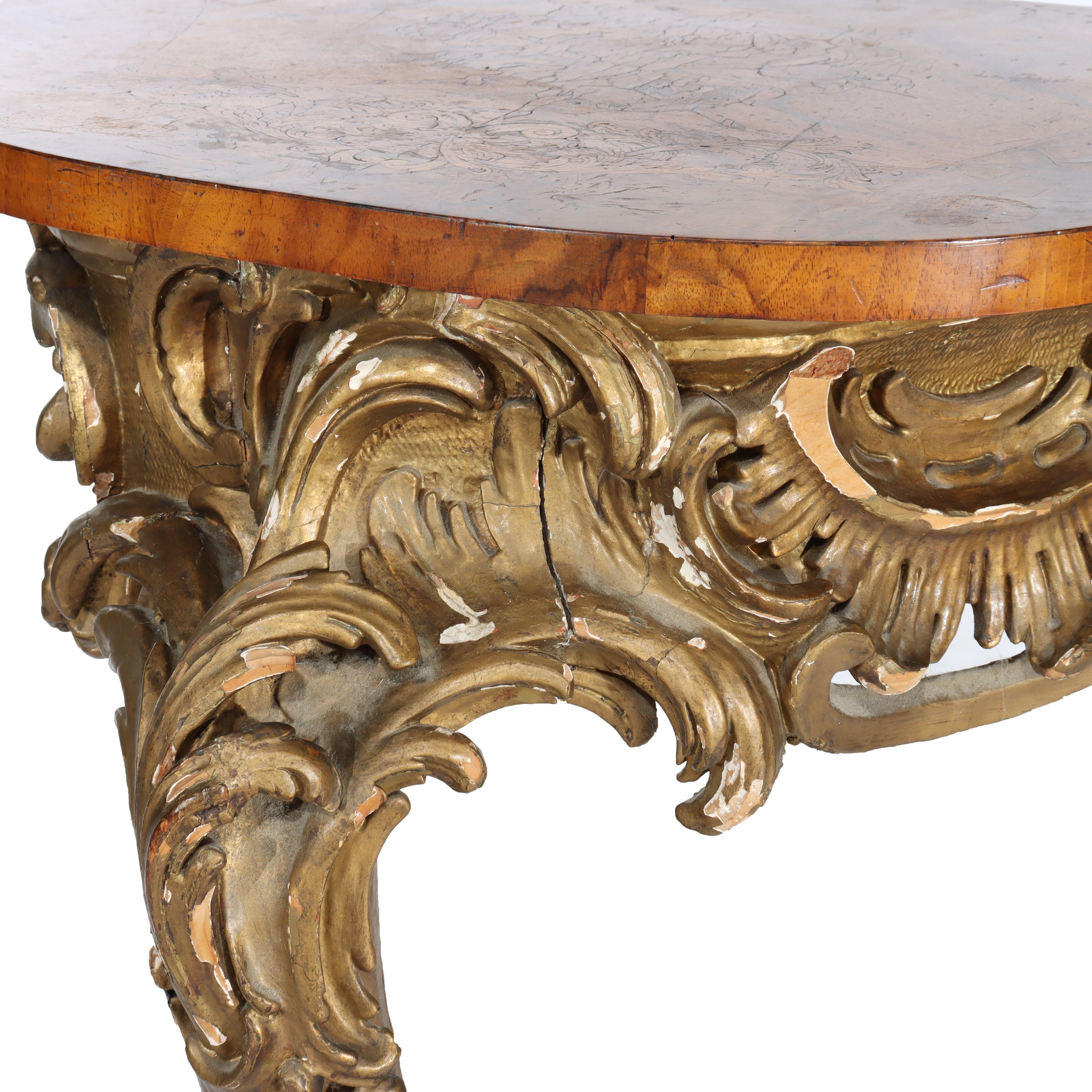 Antiker Louis XIV Konsolentisch mit Intarsien aus geflammtem Mahagoni oder Wurzelholz und vergoldetem Holz mit floralen Einlegearbeiten 18.
Maße - 32 