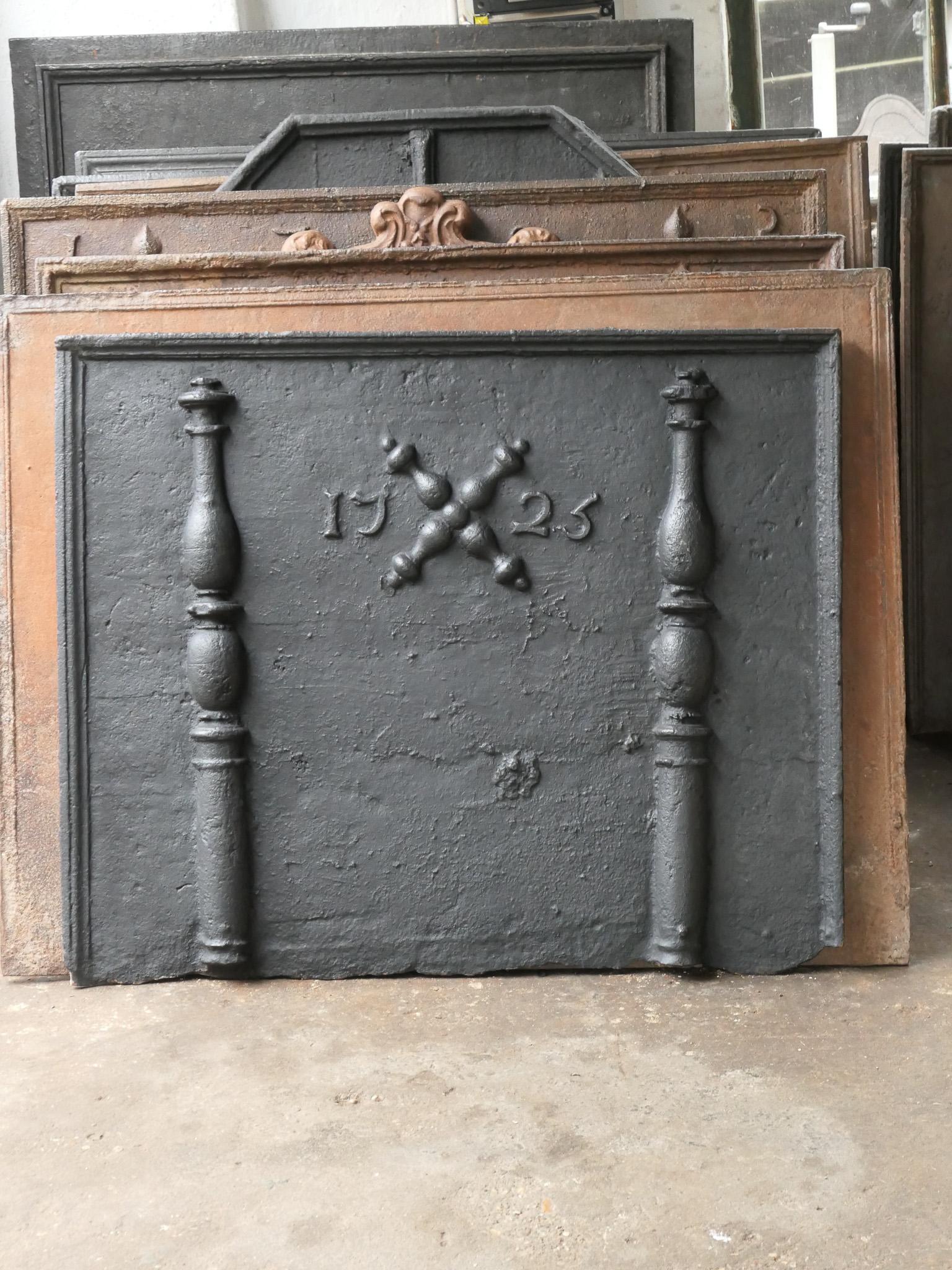 18th century French fireback with a Saint Andrew's cross and two pillars of Hercules. Saint Andrew is said to have been martyred on a cross in this shape. The cross is since then a sign for humility and sacrifice. The pillars of Hercules symbolize