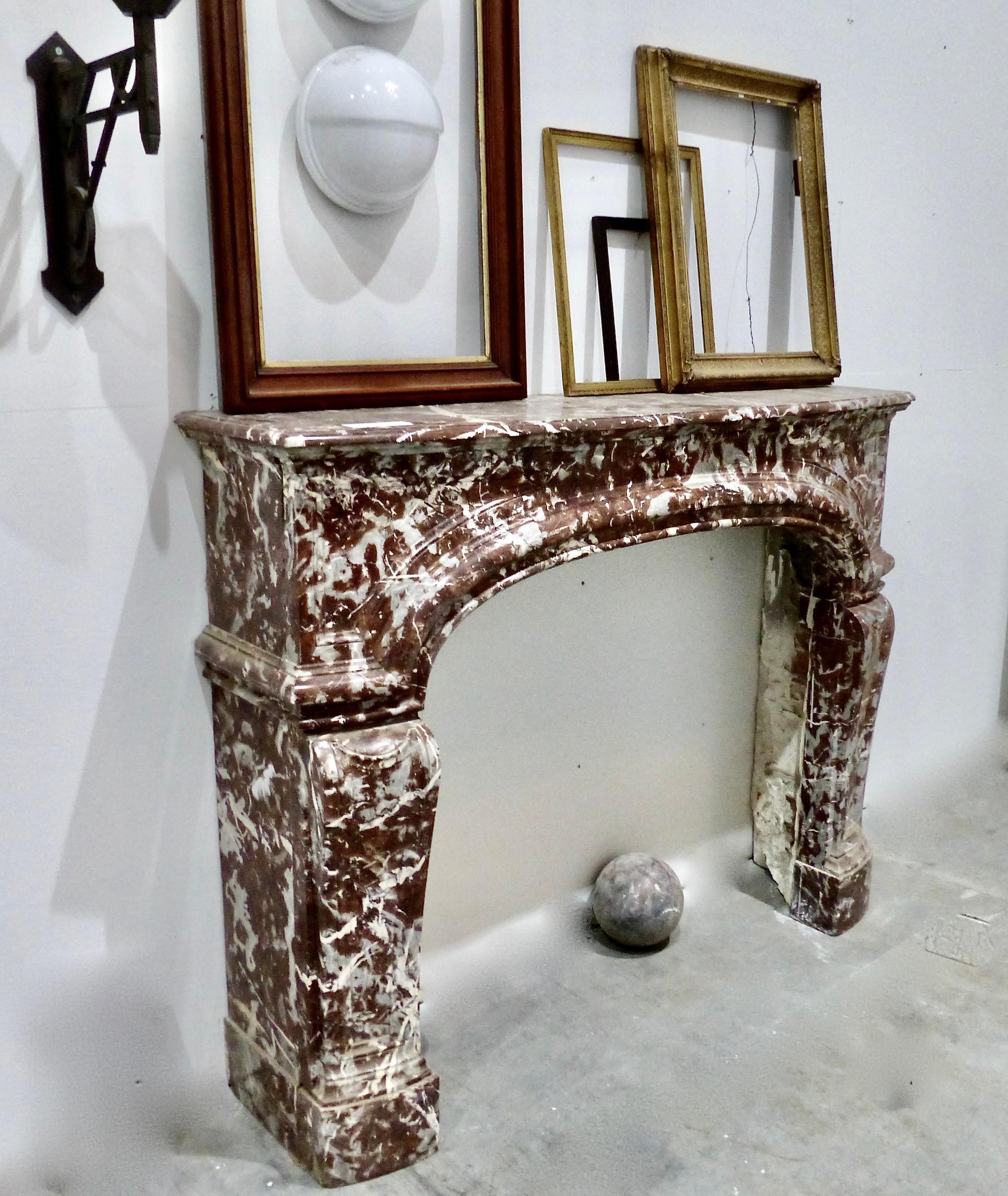 A handsome arched fireplace surround from Belgium. Extraordinary and rare antique marble with hand carved details throughout. Recently acquired from a private collection. Salvaged in Paris.
Dimensions: 48” x 60” W x 15” D
Interior dims 39