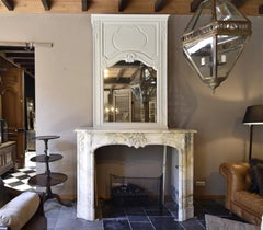 Antique Louis XV firplace mantle with mirror and cast iron interior 19th Century