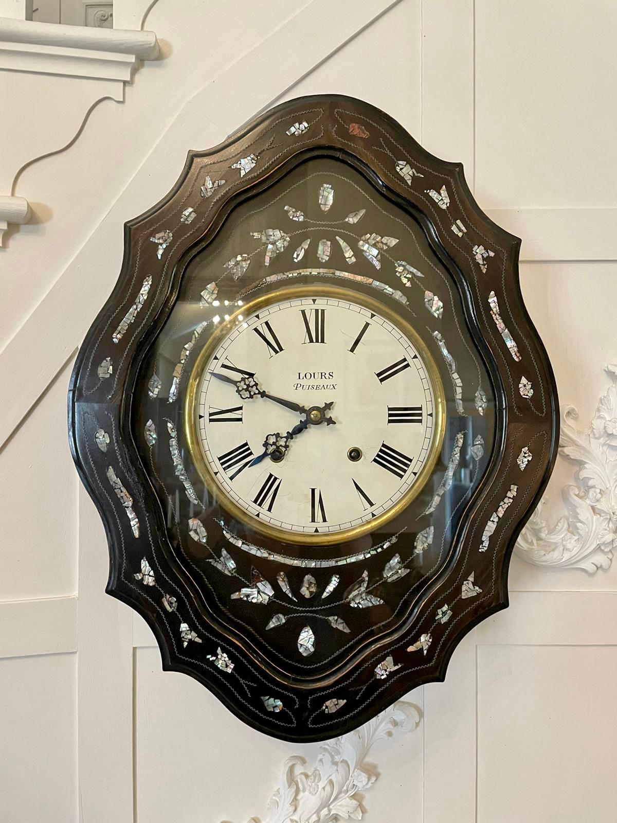 Antique Louis XV French inlaid ebonised eight day wall clock signed Lours of Puiseaux having a quality inlaid mother of Pearl shaped case with a circular white enamel painted dial with Roman numerals, original hands, brass bezel, eight day movement