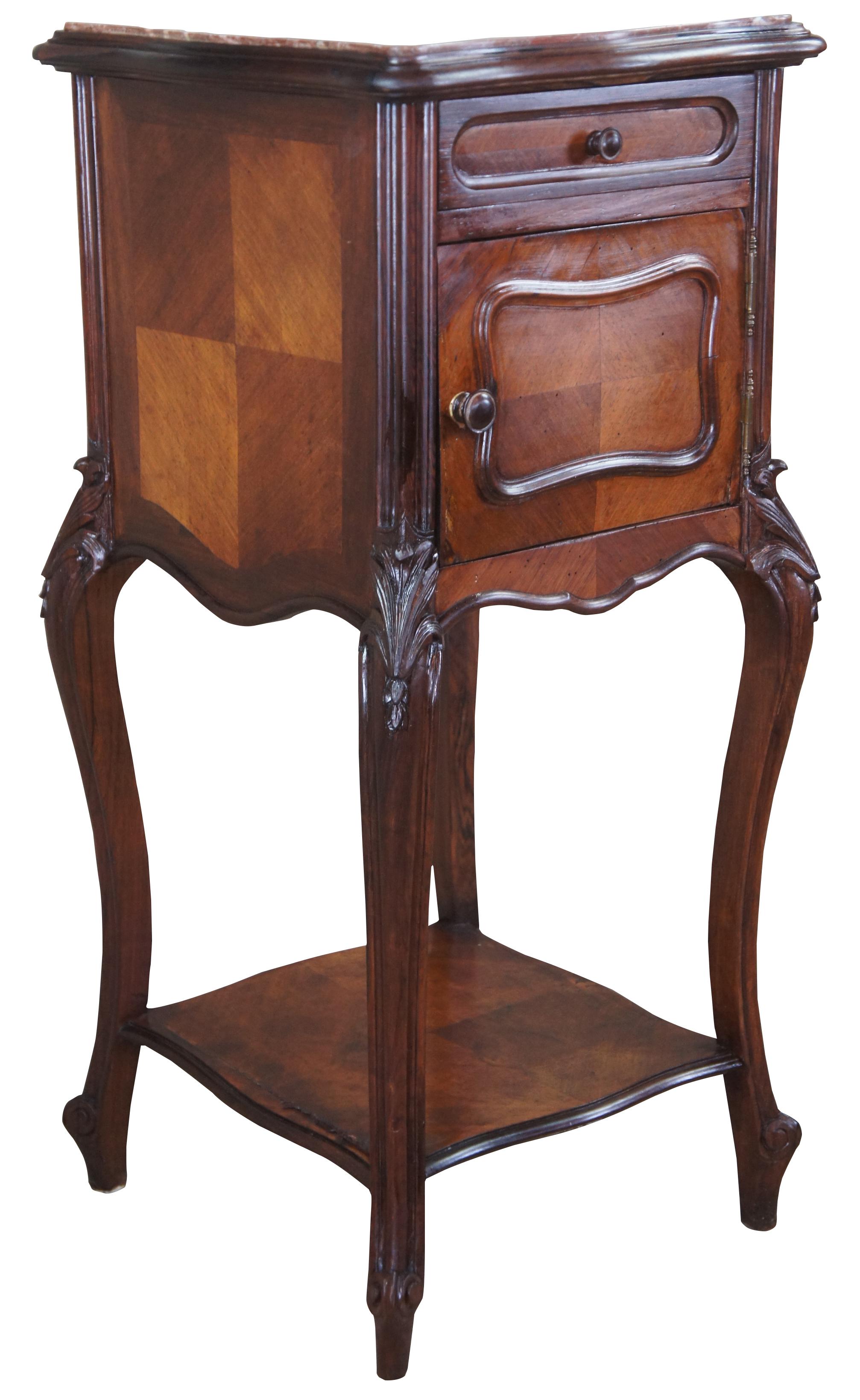 Antique Louis XV French humidor cabinet side table. Made of walnut featuring a serpentine form with two tiers, inset marble top, Matchbook veneered (parquetry) accents, one cabinet (humidor) lined with marble, one dovetailed drawer and scrolled