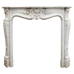 Antique Louis XV marble firplace mantel from the 19th Century