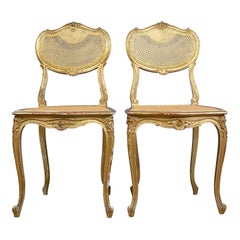 Chaises de salon anciennes de style Louis XV:: françaises:: en bois doré et en bois de roseau:: vers 1900