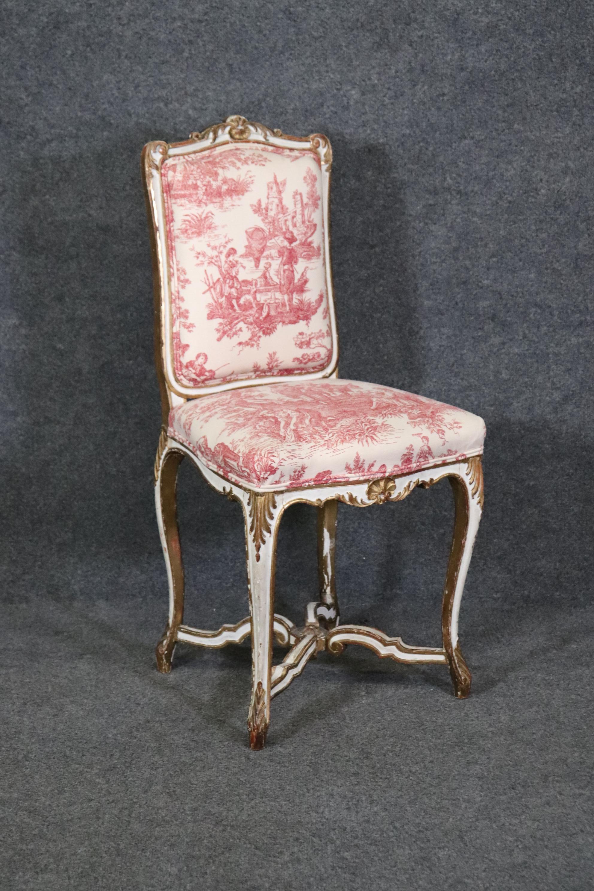 Dimensions- H: 36 1/4in W: 17 3/4in D: 16in SH: 20in 

This antique Louis XV style desk chair is made of the highest quality and is perfect for you and your home! If you look at the photos provided, you see the paint and gilt decoration, as well as